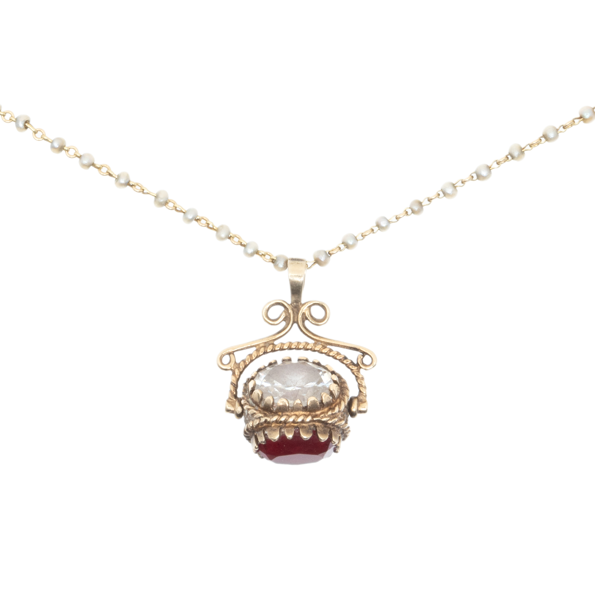 Bicolor gold chain with alternating pearls, accompanied by mobile pendant