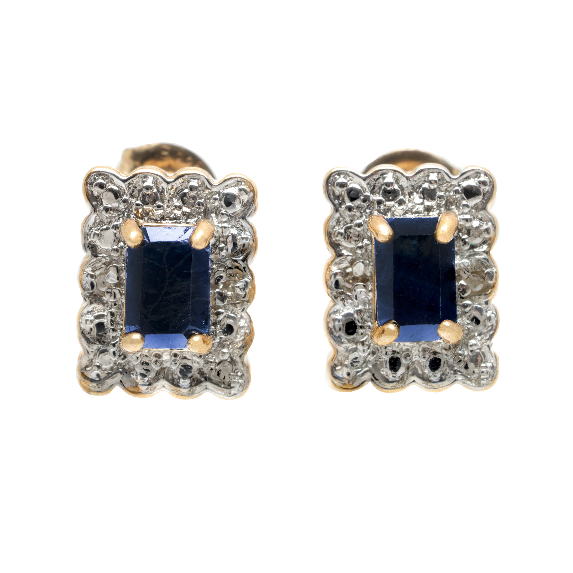 Pair of silver earrings, decorated with sapphires and diamonds