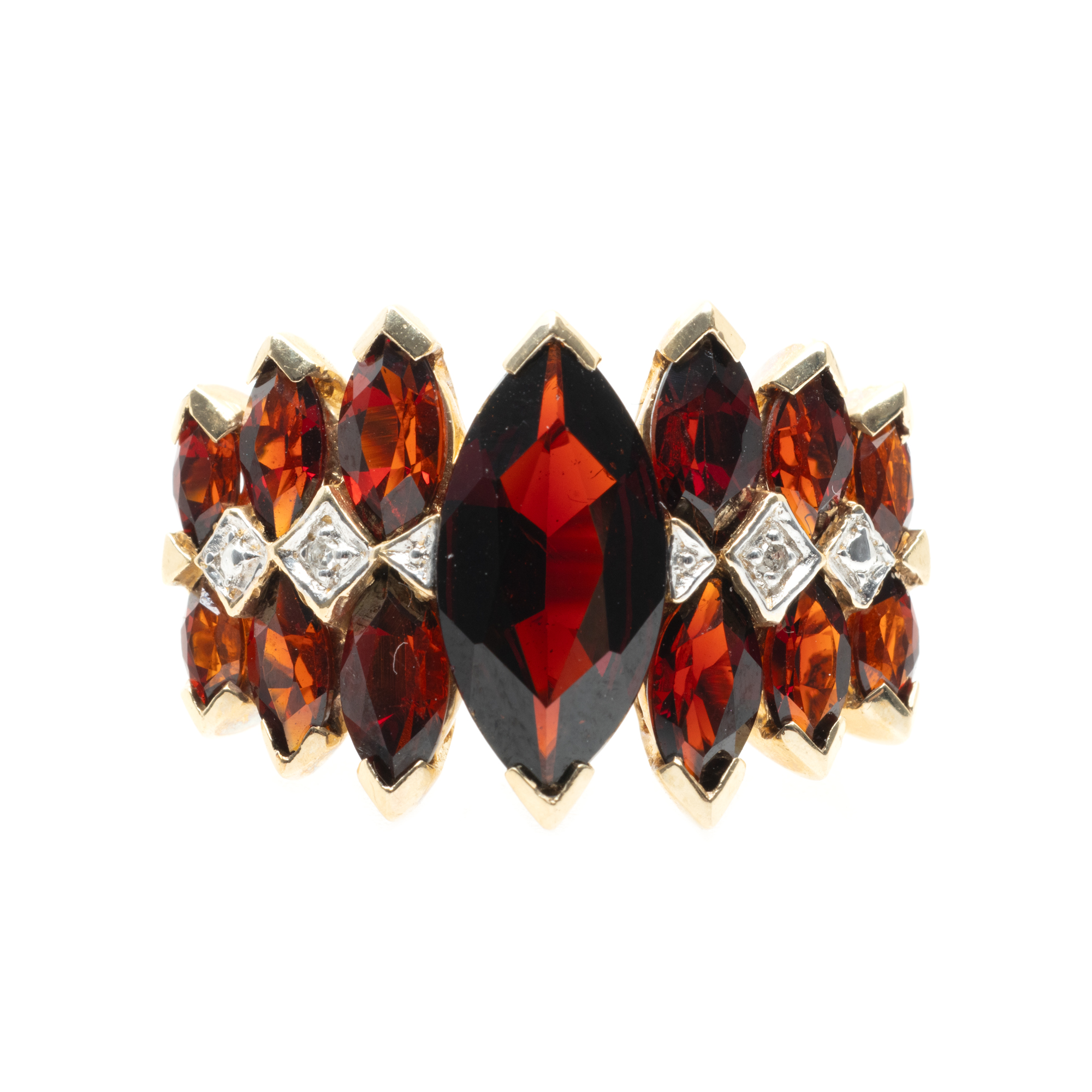 Gold ring, decorated with garnets and diamonds