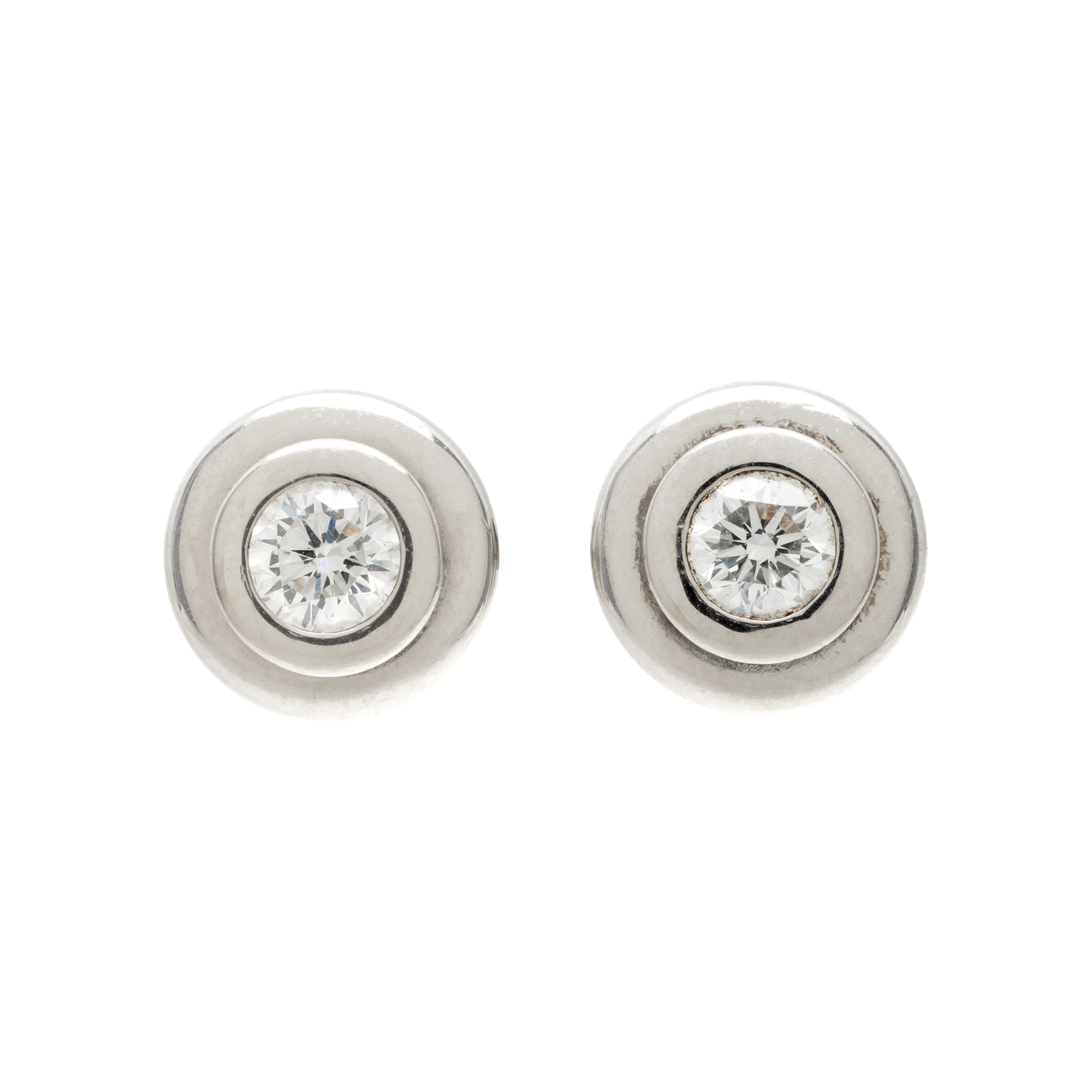 Pair of white gold earrings, decorated with two diamonds