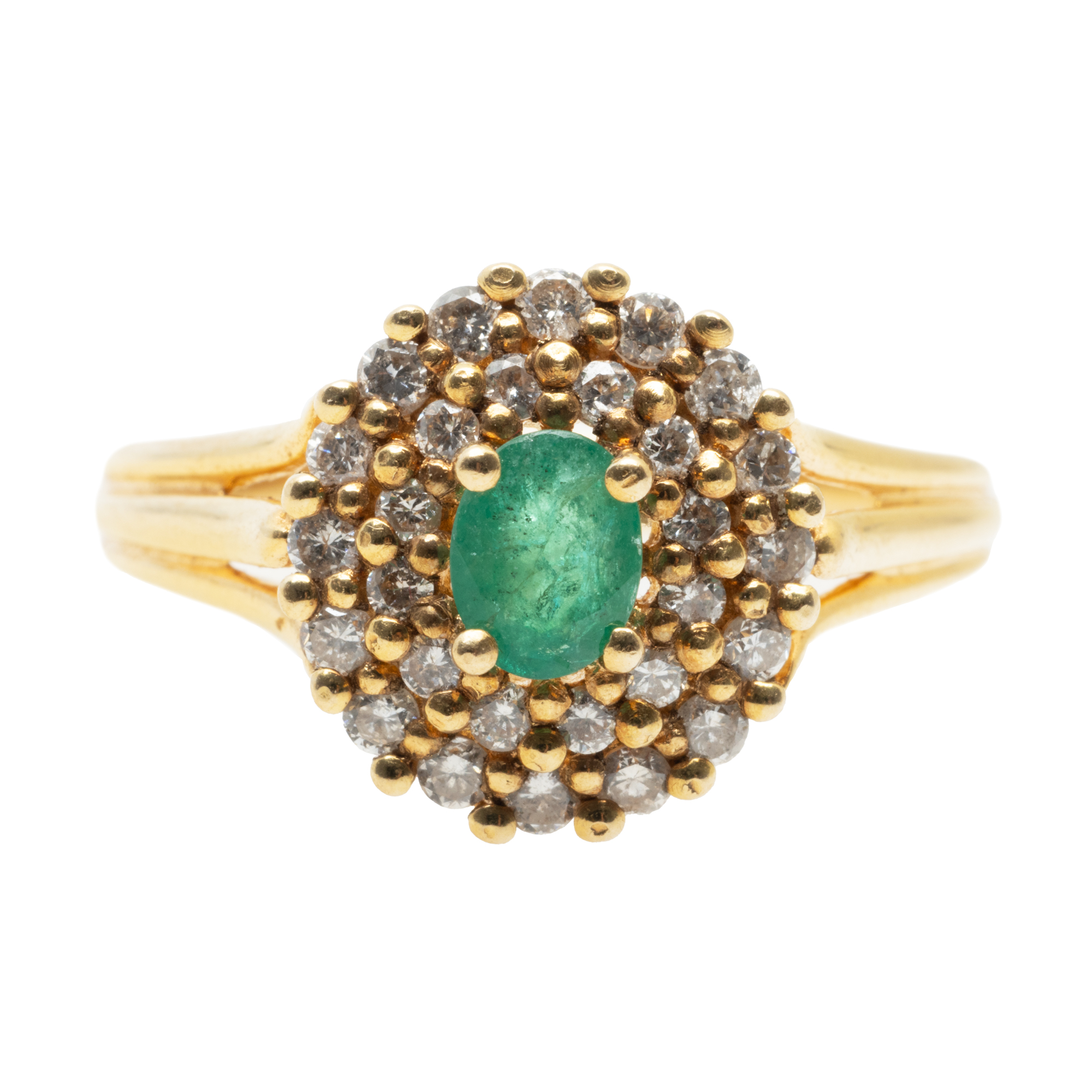 Gold ring, decorated with an emerald surrounded by diamonds