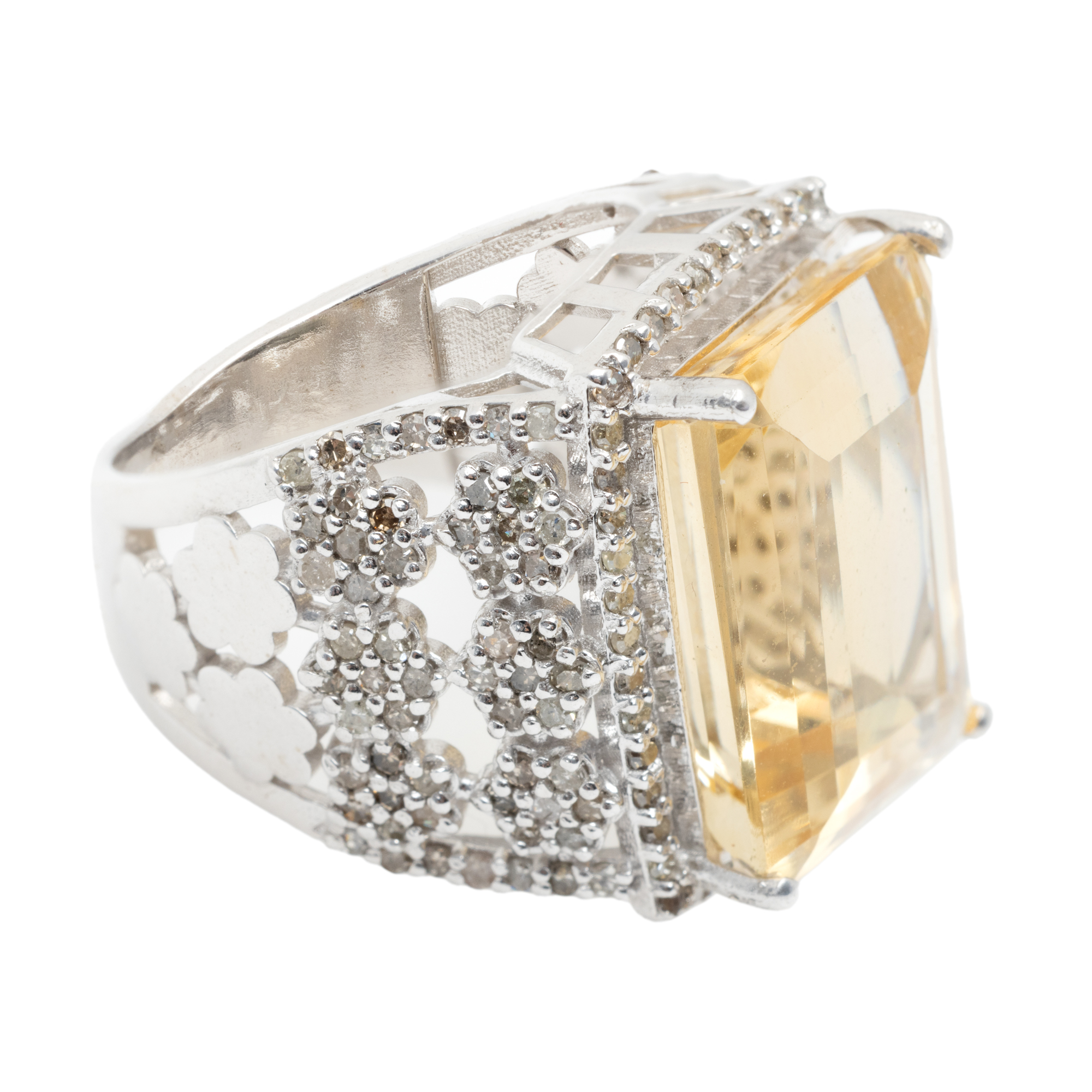 Massive silver ring, decorated with citrine and diamonds