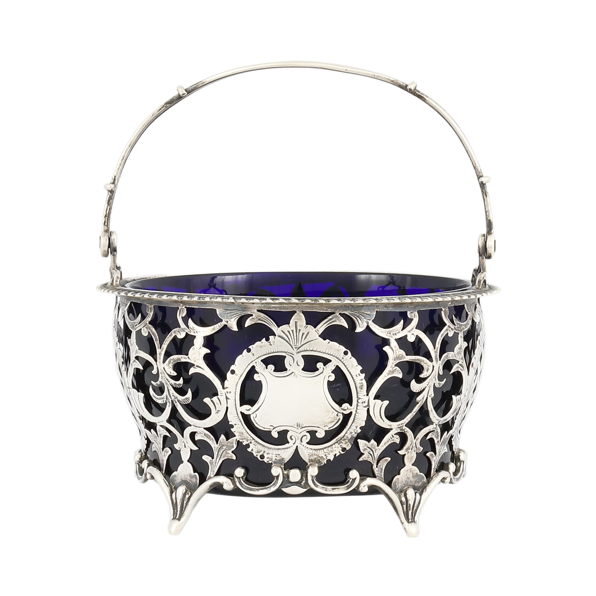 Small Edwardian style basket, made of silver and cobalt glass, decorated with vegetal elements, circa 1910.