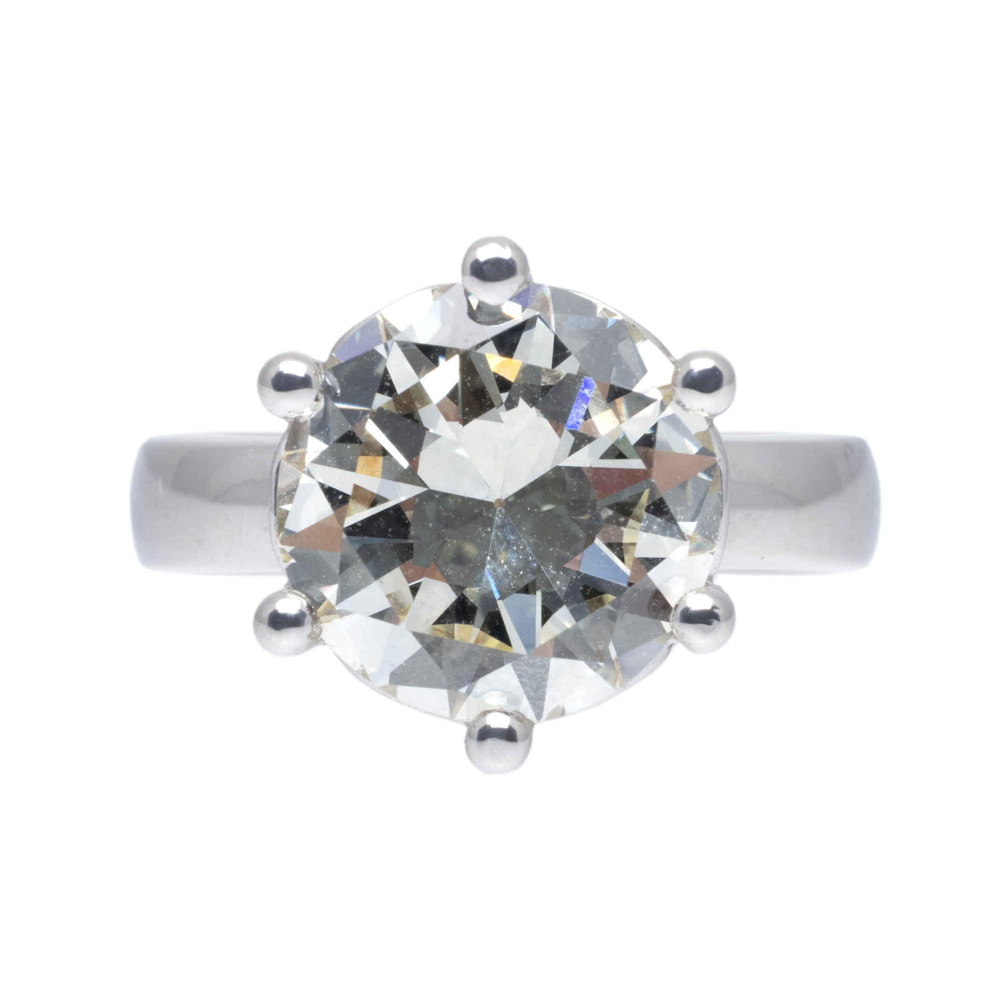 Inel solitaire din aur alb, ornat cu un diamant 4,77 ct.