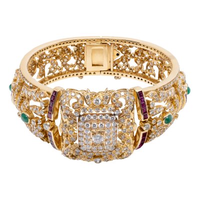 Gold bracelet, decorated with diamonds, emeralds and rubies