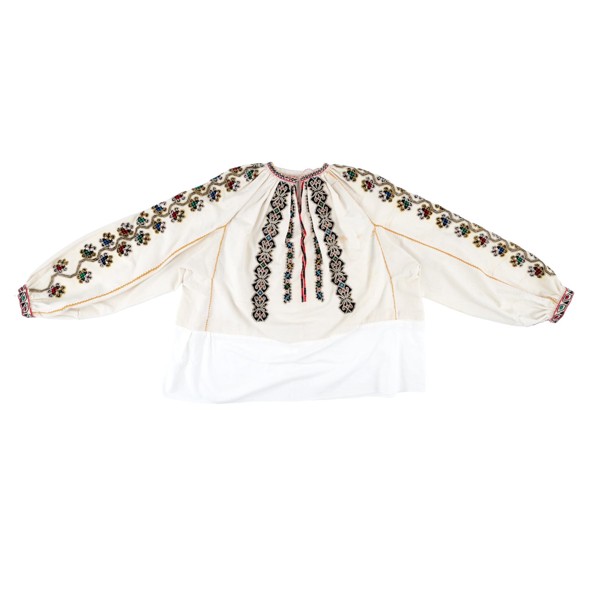 Shirt with decorative pleats, sewn with black thread and color accents, embroidery is adorned with metallic thread and sequins, the pleats are decorative and sewn with orange thread, the ornament called "shepherd's hook" is a recurrence of the neolithic ornamentation, Vrancea area, end of the 19th century.