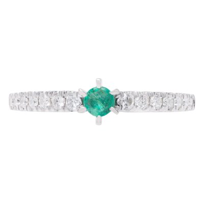 White gold ring, decorated with an emerald and diamonds