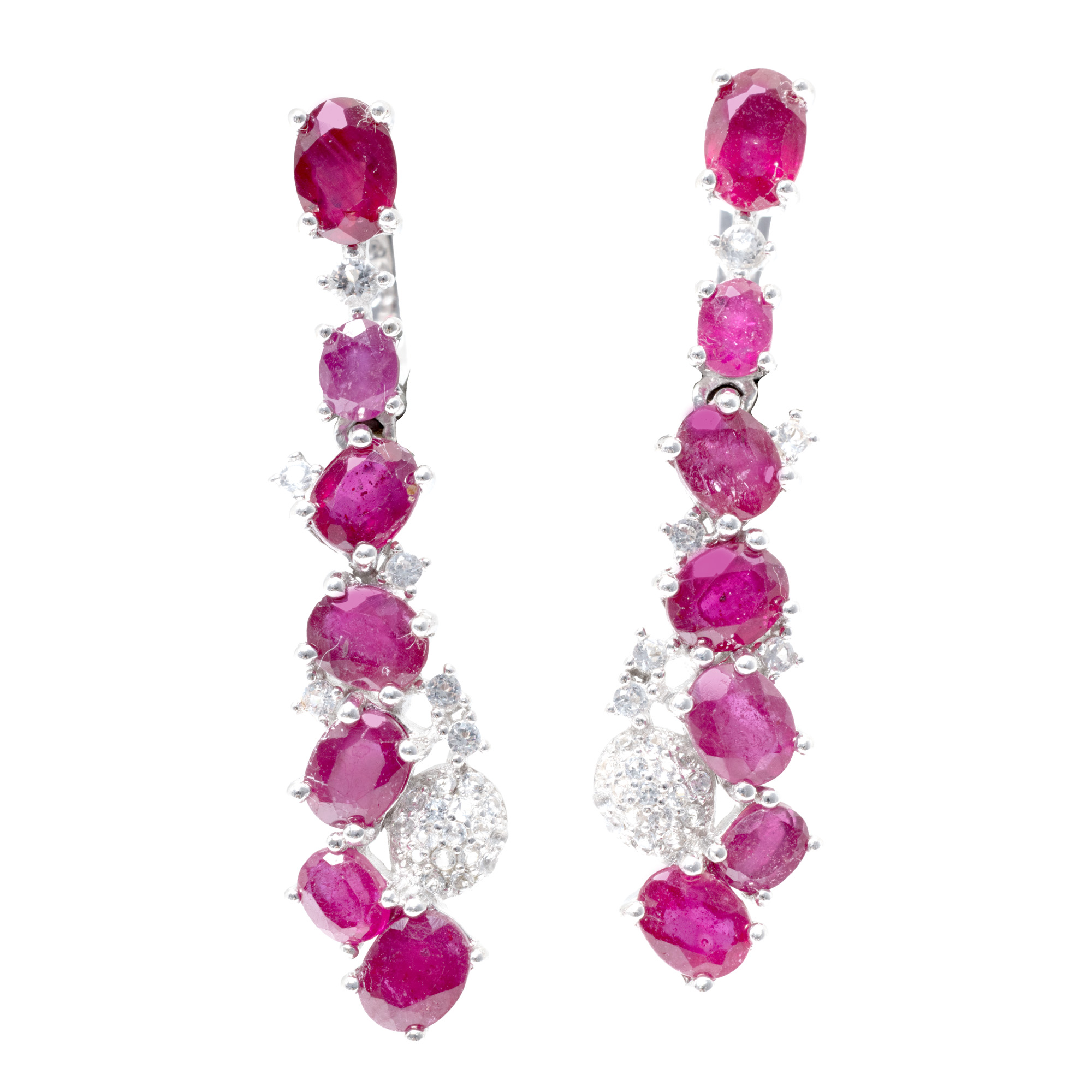 Pair of silver earrings, decorated with rubies and topazes