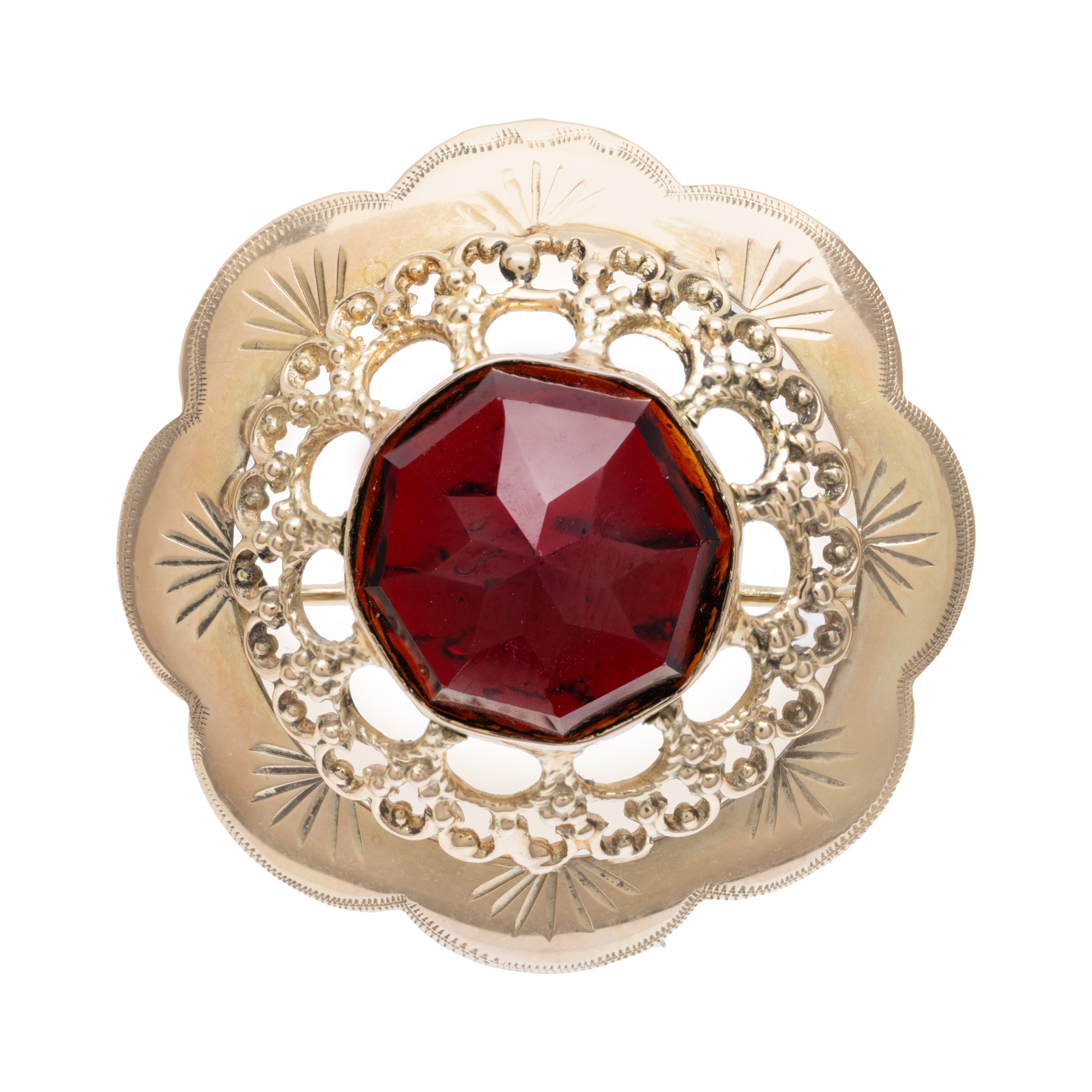 Gold brooch in the shape of a flower, decorated with a garnet