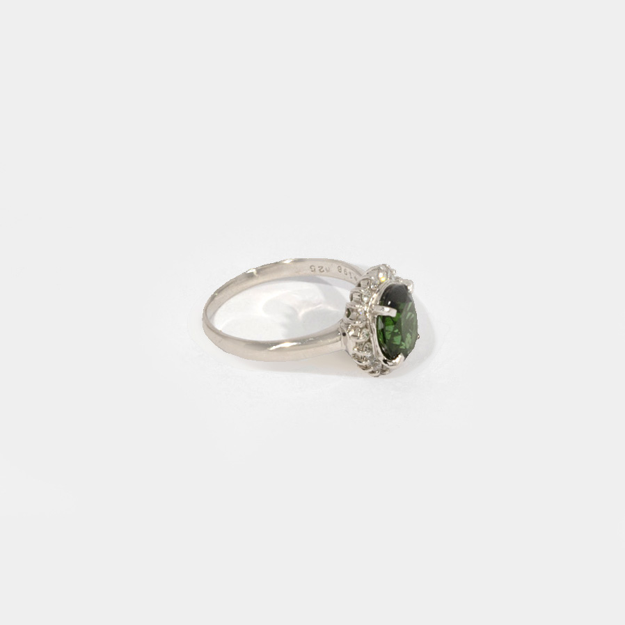 Platinum ring, decorated with tourmaline and diamonds
