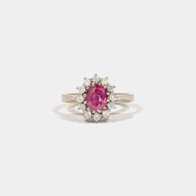 White gold ring, decorated with ruby surrounded by diamonds