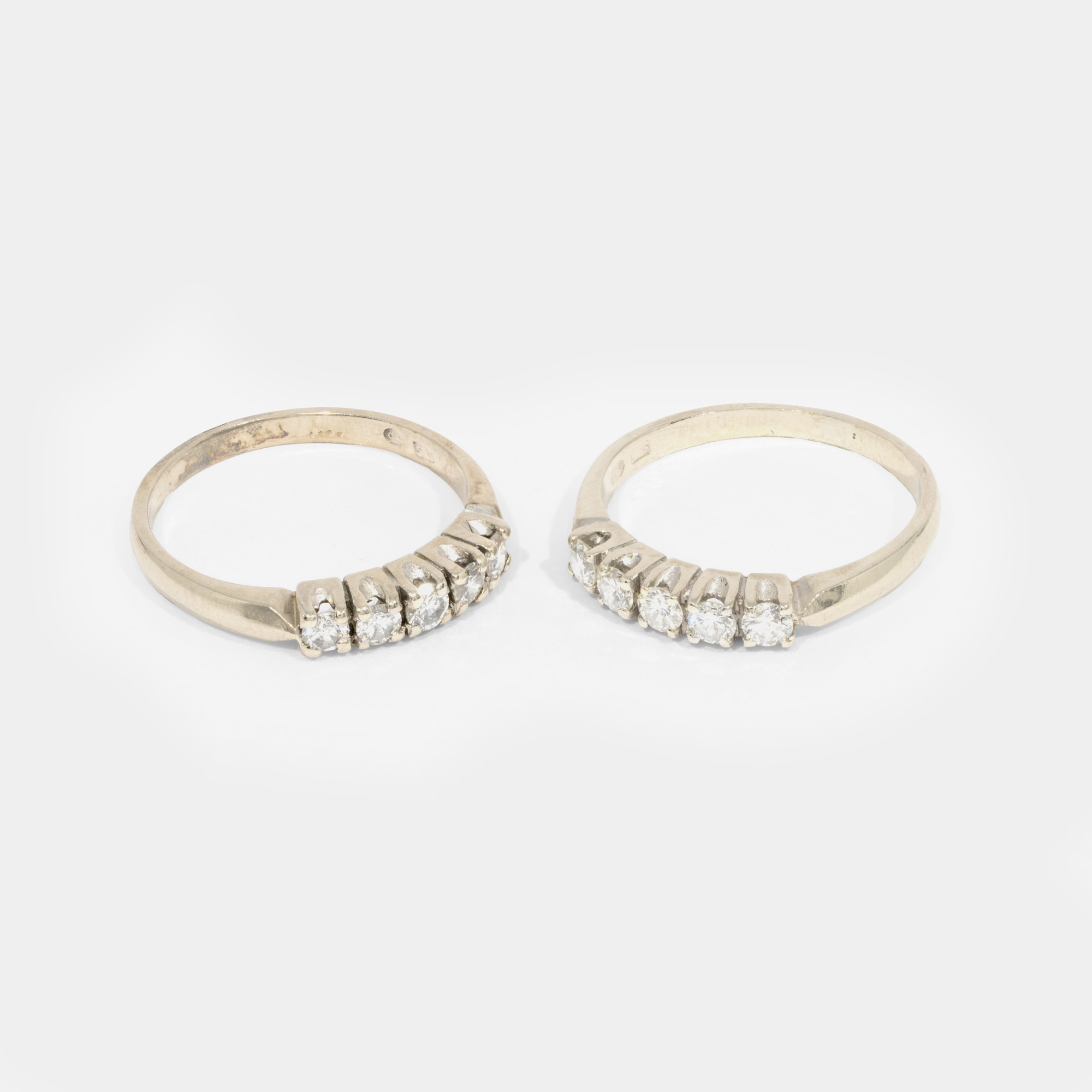 Pair of white gold rings, decorated with diamonds