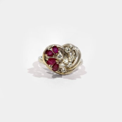 "Tourbillon" - White gold ring, decorated with rubies and diamonds