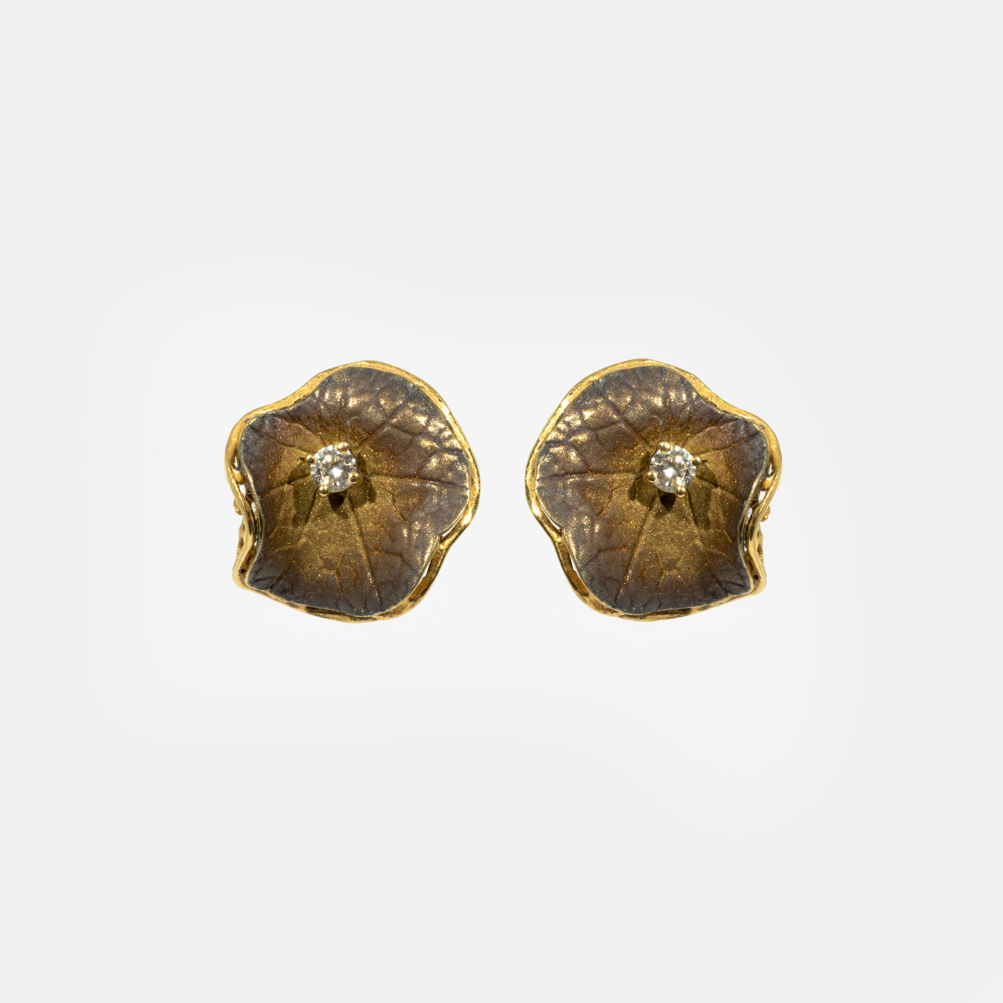 Pair of gold earrings, in the shape of a leaf, decorated with diamonds