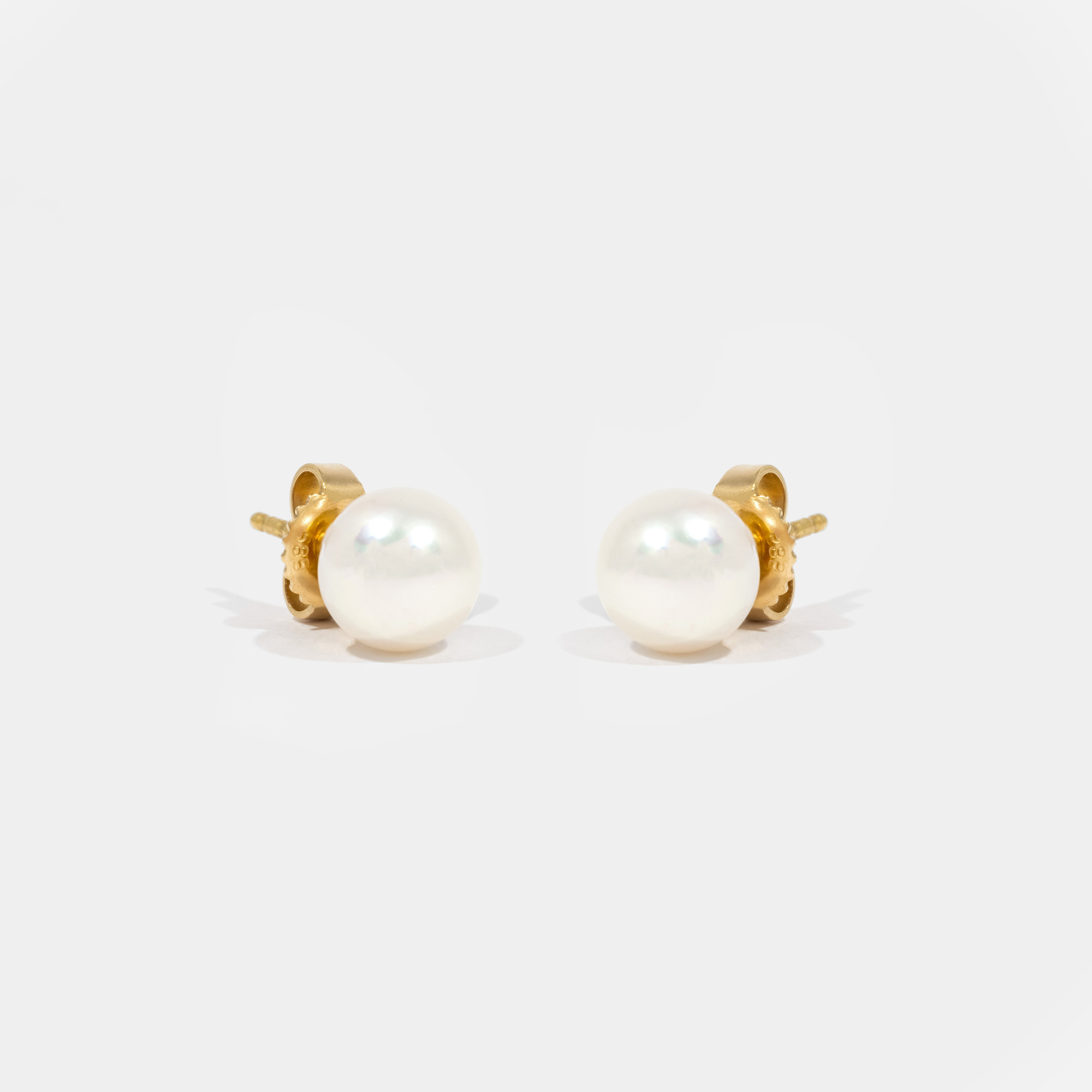 Mikimoto pair of gold earrings, decorated with Akoya pearls, in the original box