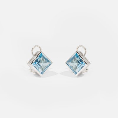 Pair of white gold earrings, decorated with topazes, accompanied by certificate