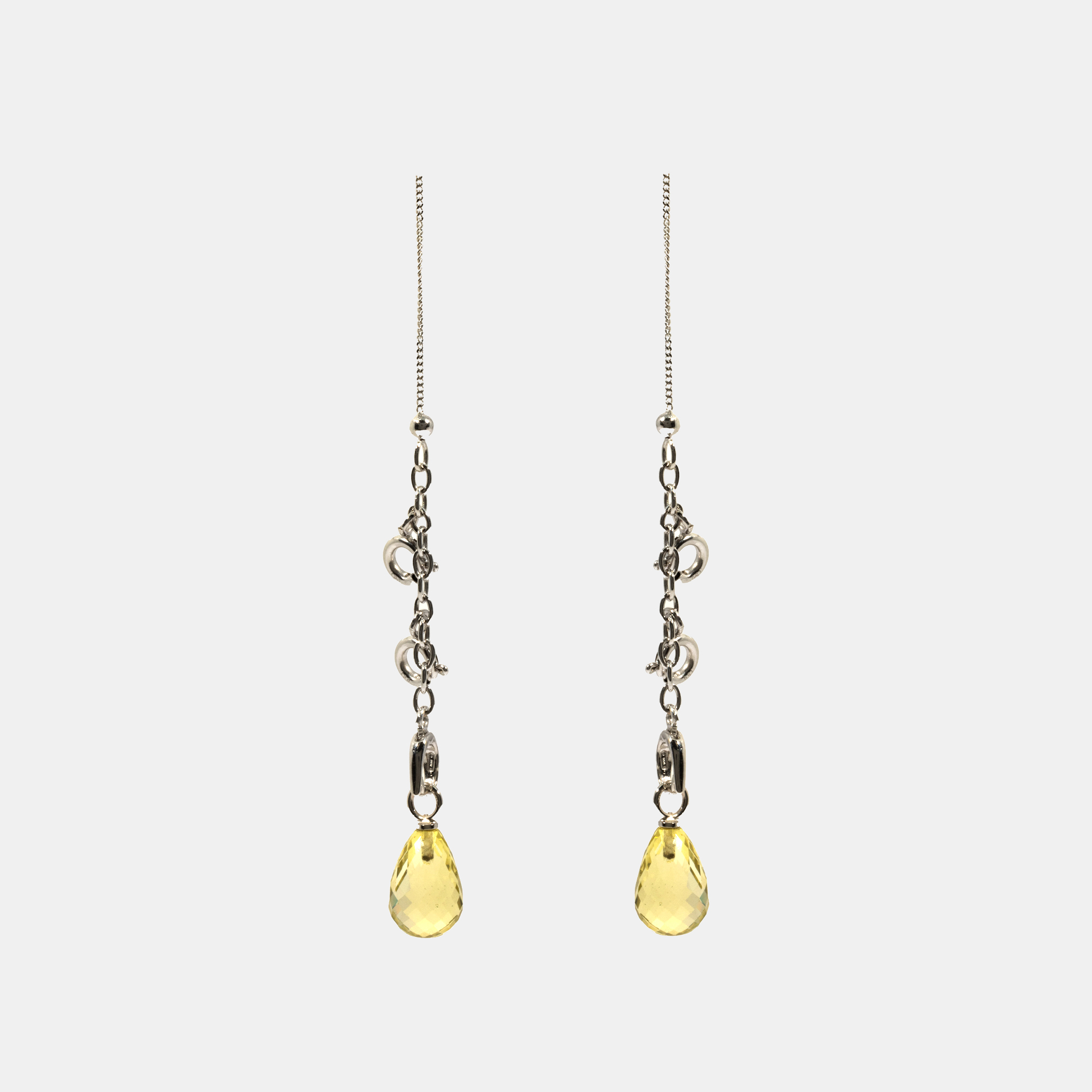 White gold earrings rod, decorated with lemon quartz