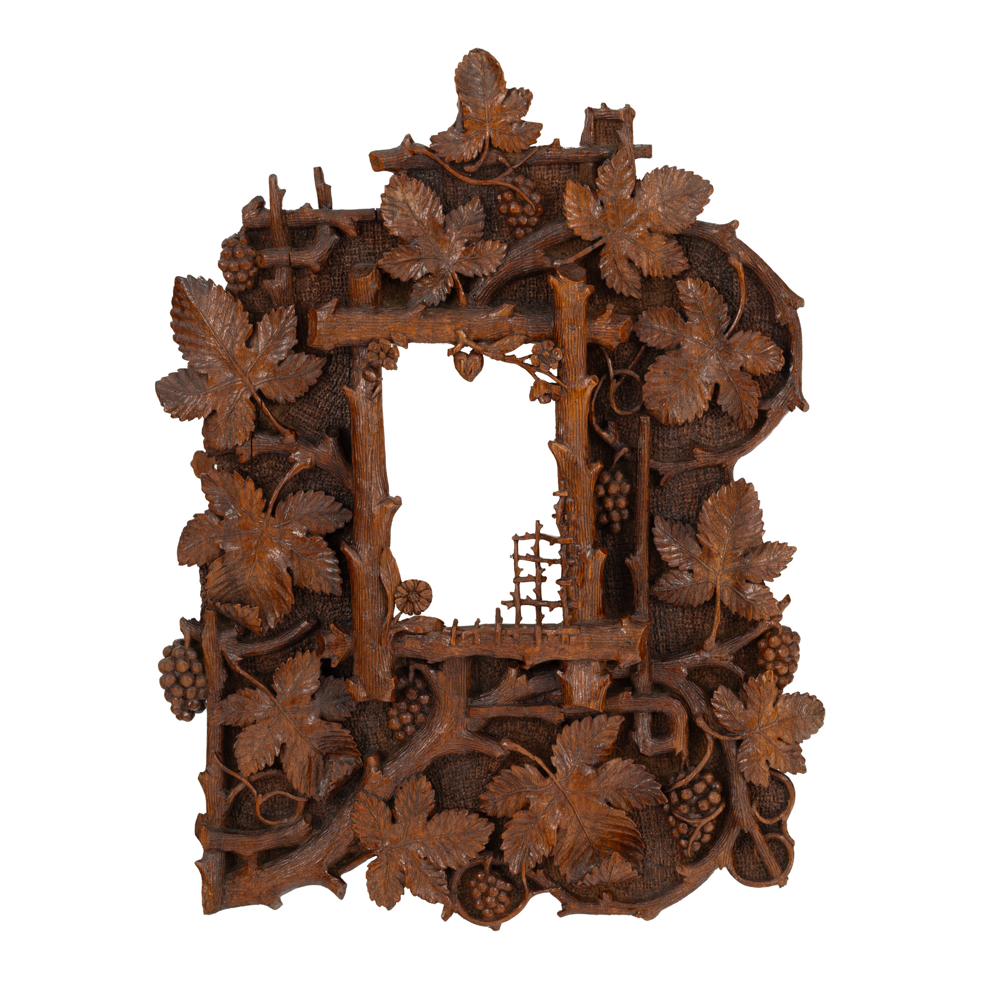 Carved wooden frame in the form of a vine, ca. 1910