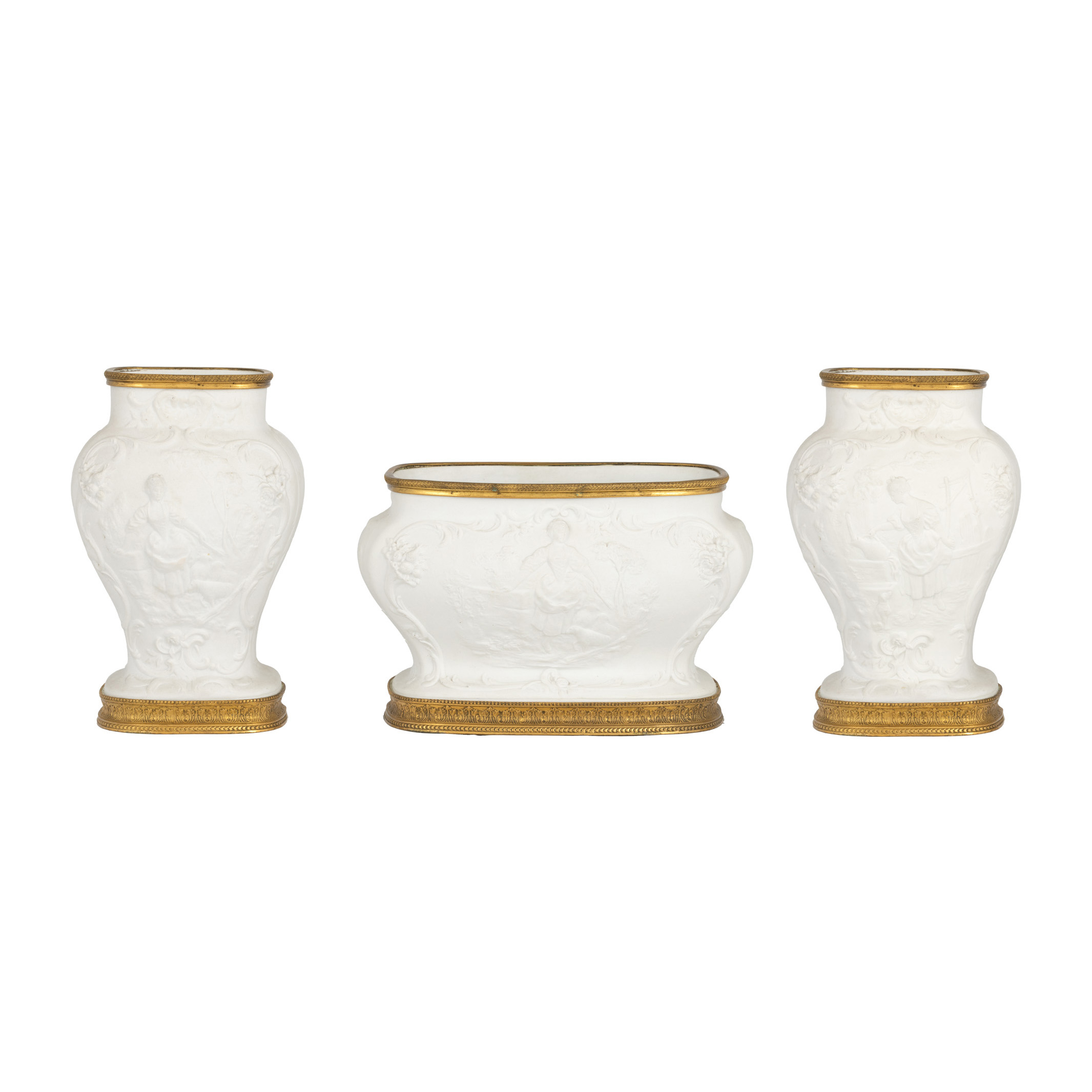 Sèvres style set, made of biscuit porcelain, consisting of three vases, decorated with gilded bronze mounts, end of the 19th century.