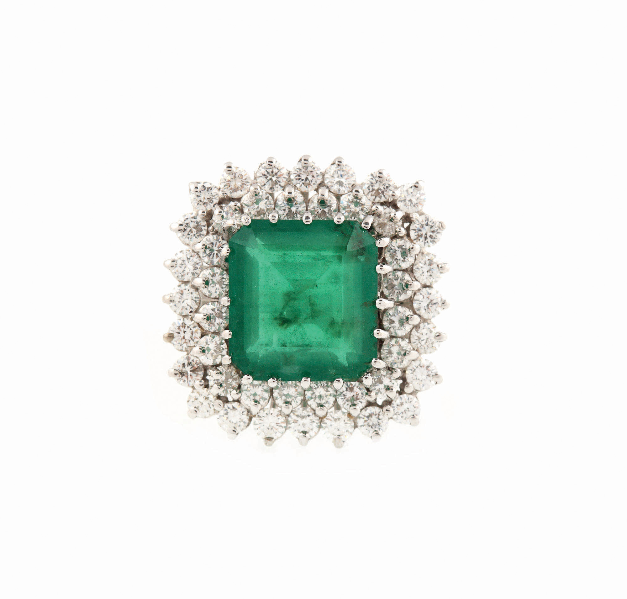 Inel din aur alb, decorat cu smarald anturat de diamante
