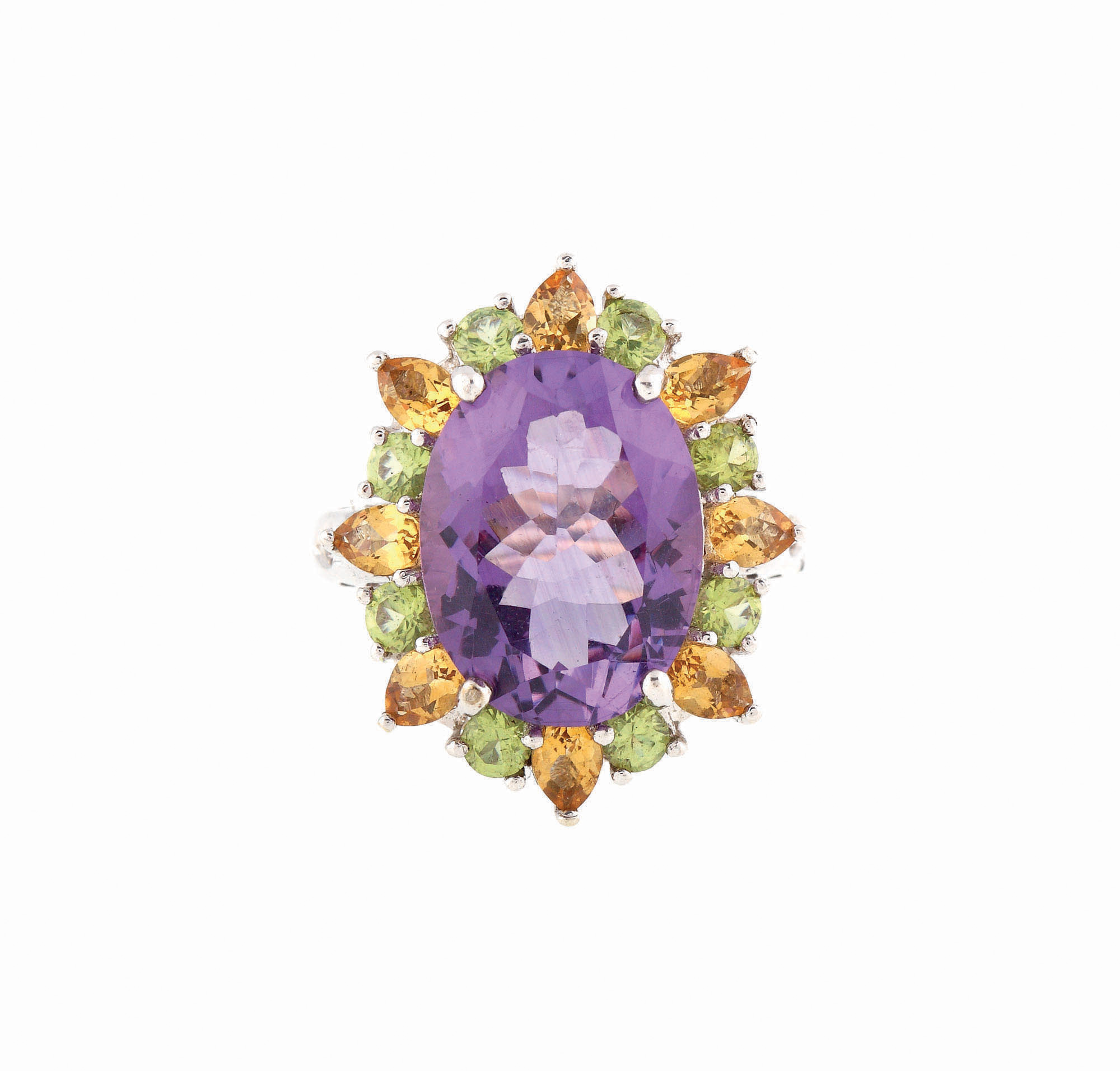 Inel decorat cu un mare ametist, anturat de citrine şi peridote