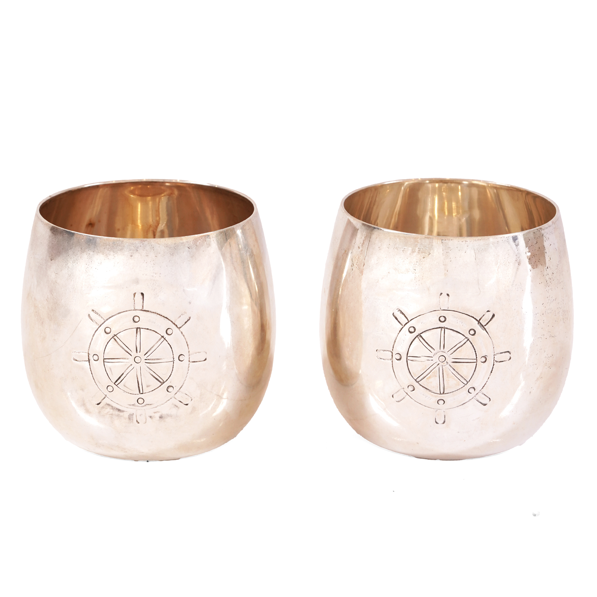 Pair of silver cups, decorated with a nautical motif, mid-20th century