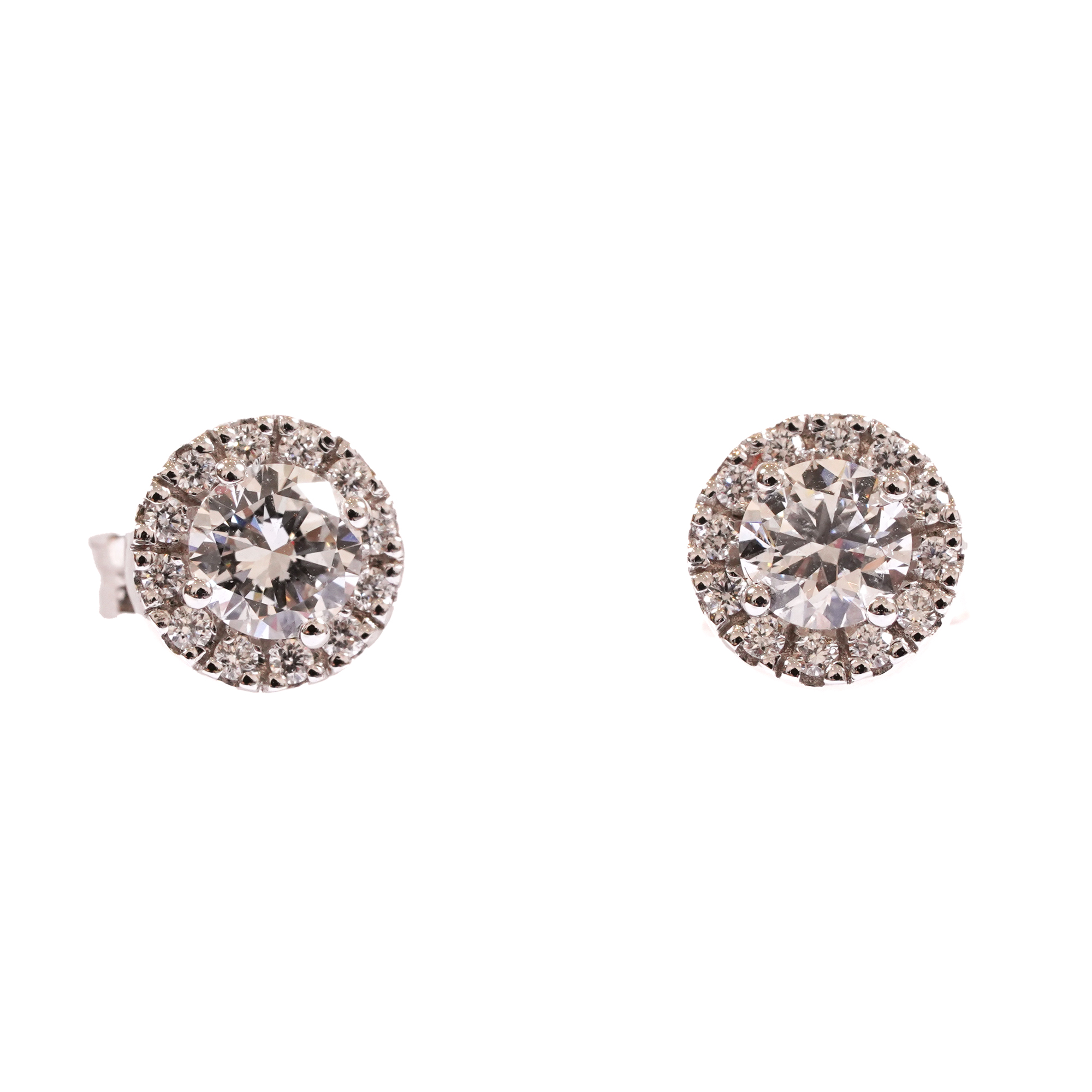A pair of white gold earrings decorated with diamonds