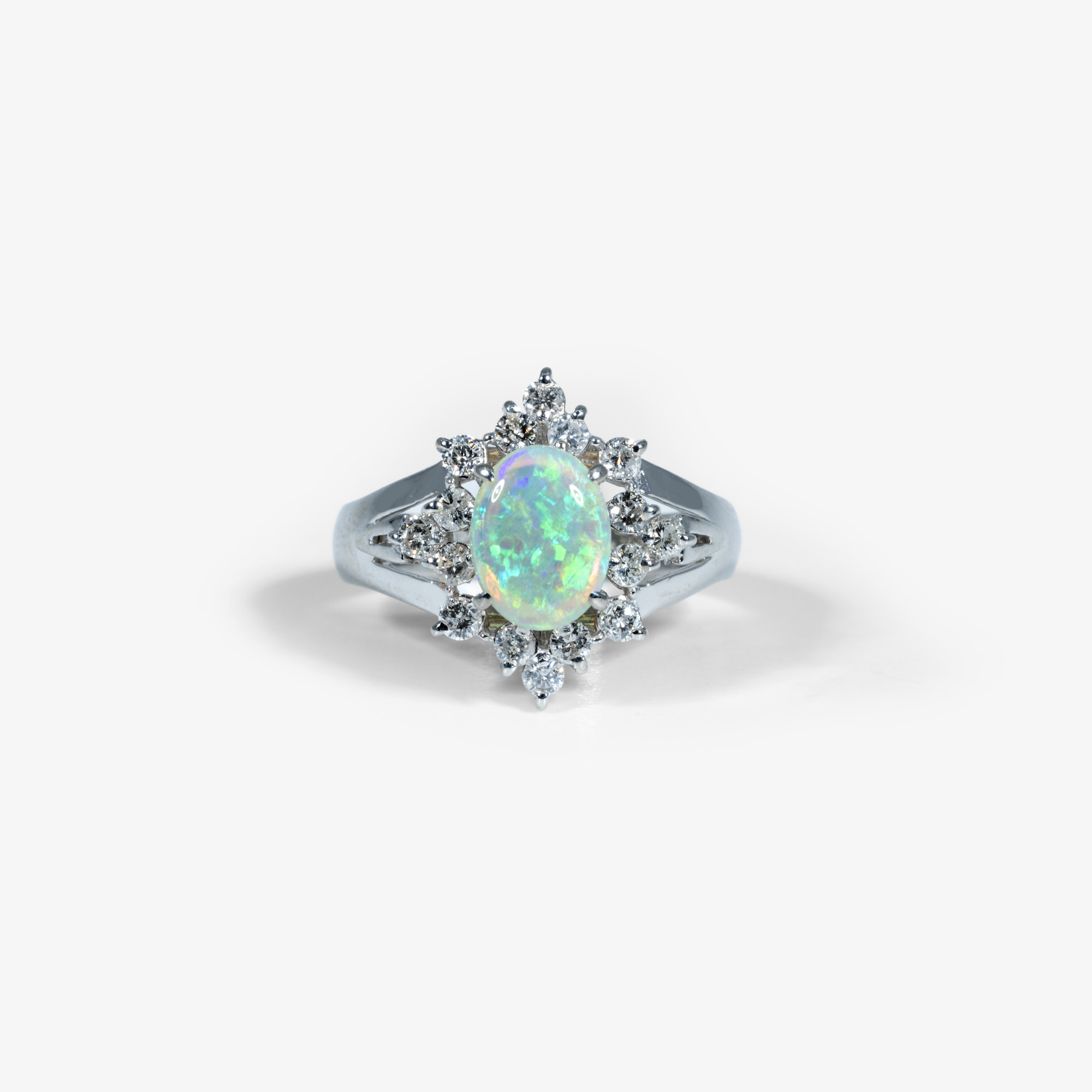Platinum ring, decorated with opal and diamonds