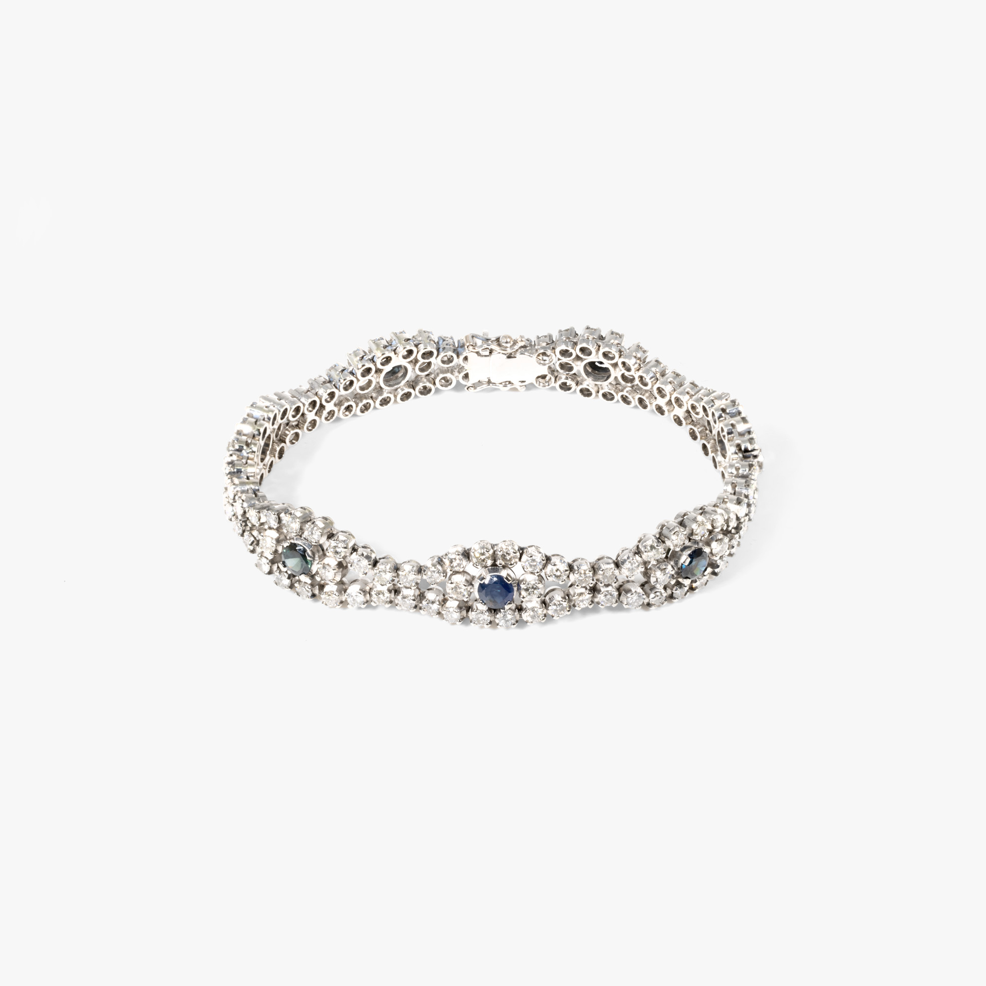 White gold bracelet, decorated with diamonds and sapphires