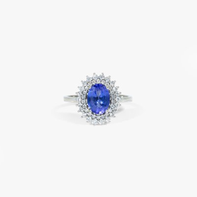 Inel din aur alb, decorat cu un tanzanit și dublu anturaj de diamante