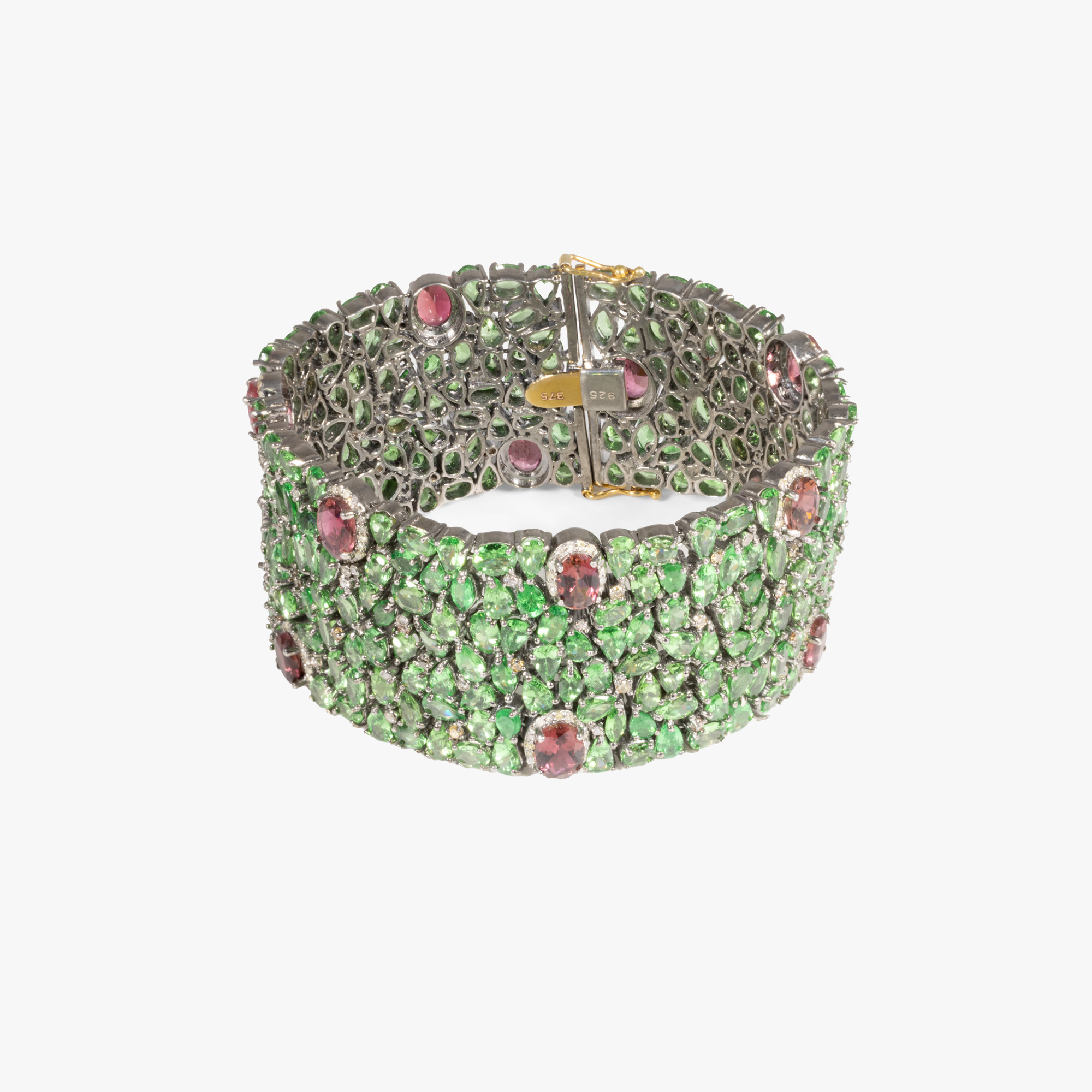 Silver and gold bracelet, decorated with tsavorites, diamonds and garnets