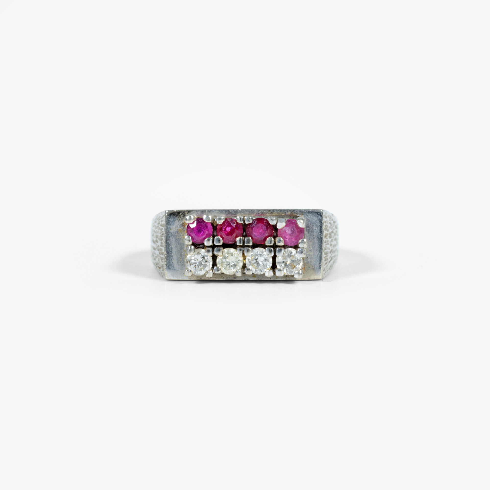 White gold ring, decorated with diamonds and rubies
