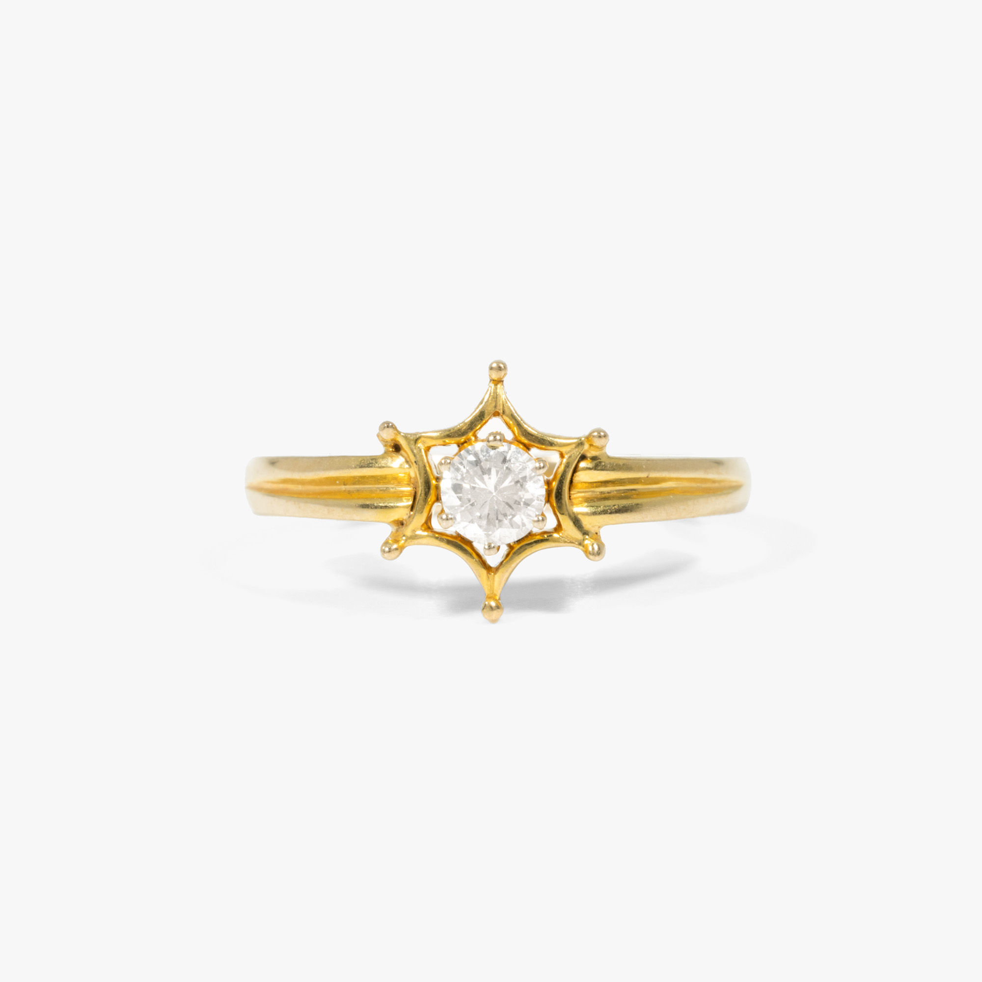 "North Star" - gold ring adorned with a solitary diamond