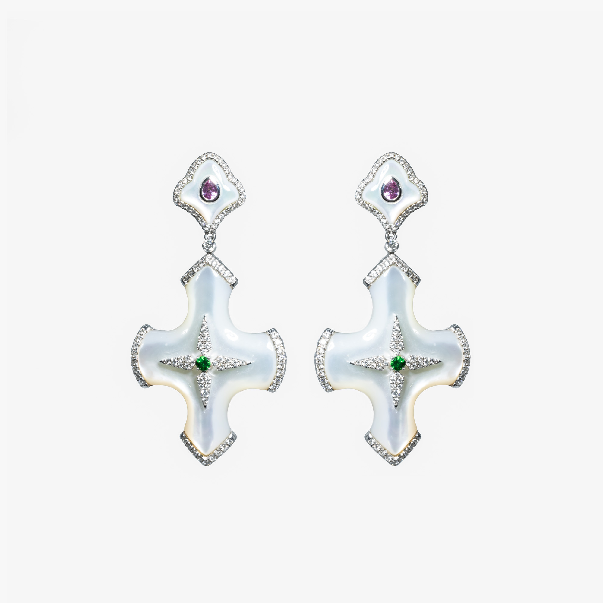 Pair of white gold and mother-of-pearl earrings, adorned with diamonds, sapphires, and tsavorites