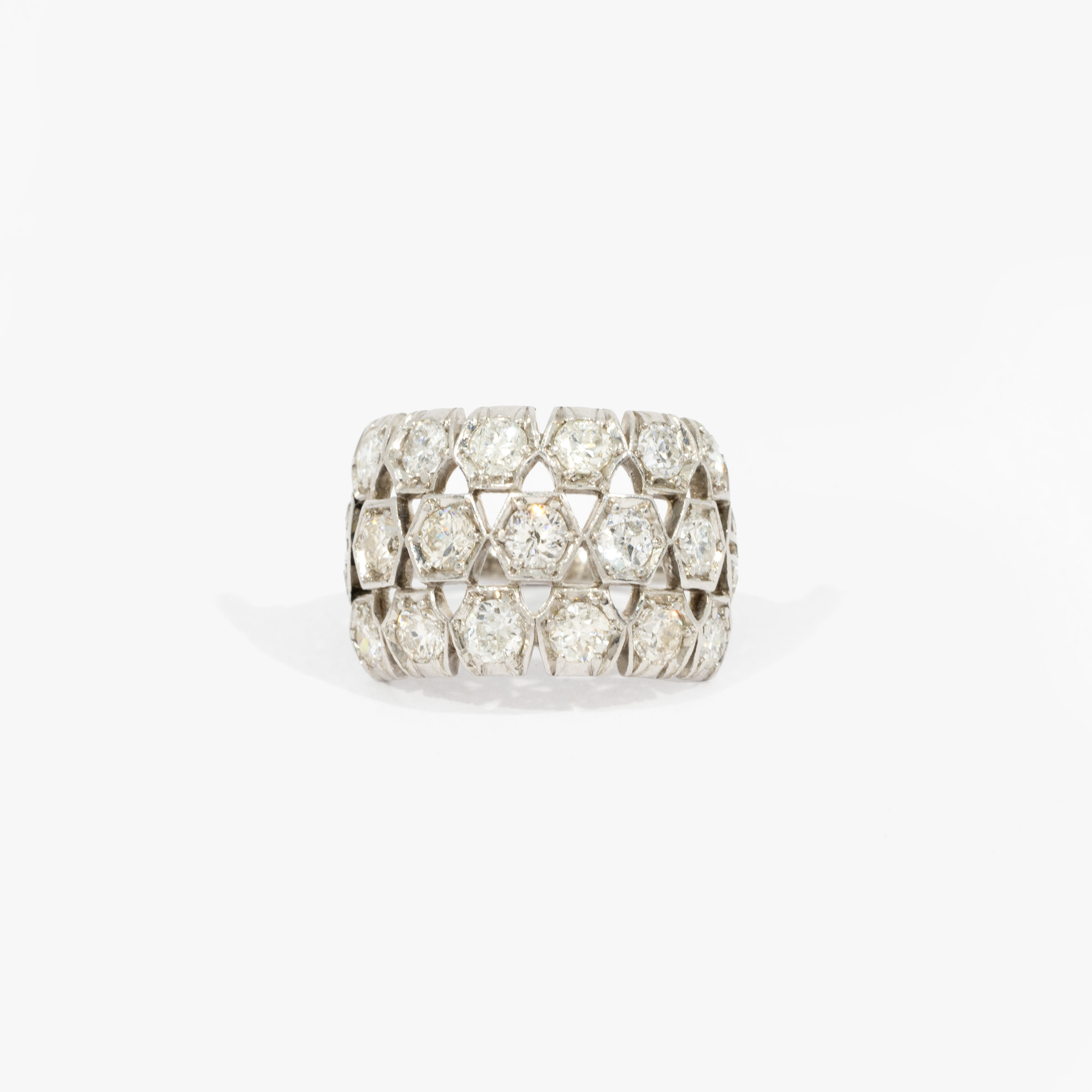 Platinum ring, decorated with geometric diamond pattern, accompanied by additional gemological certificate