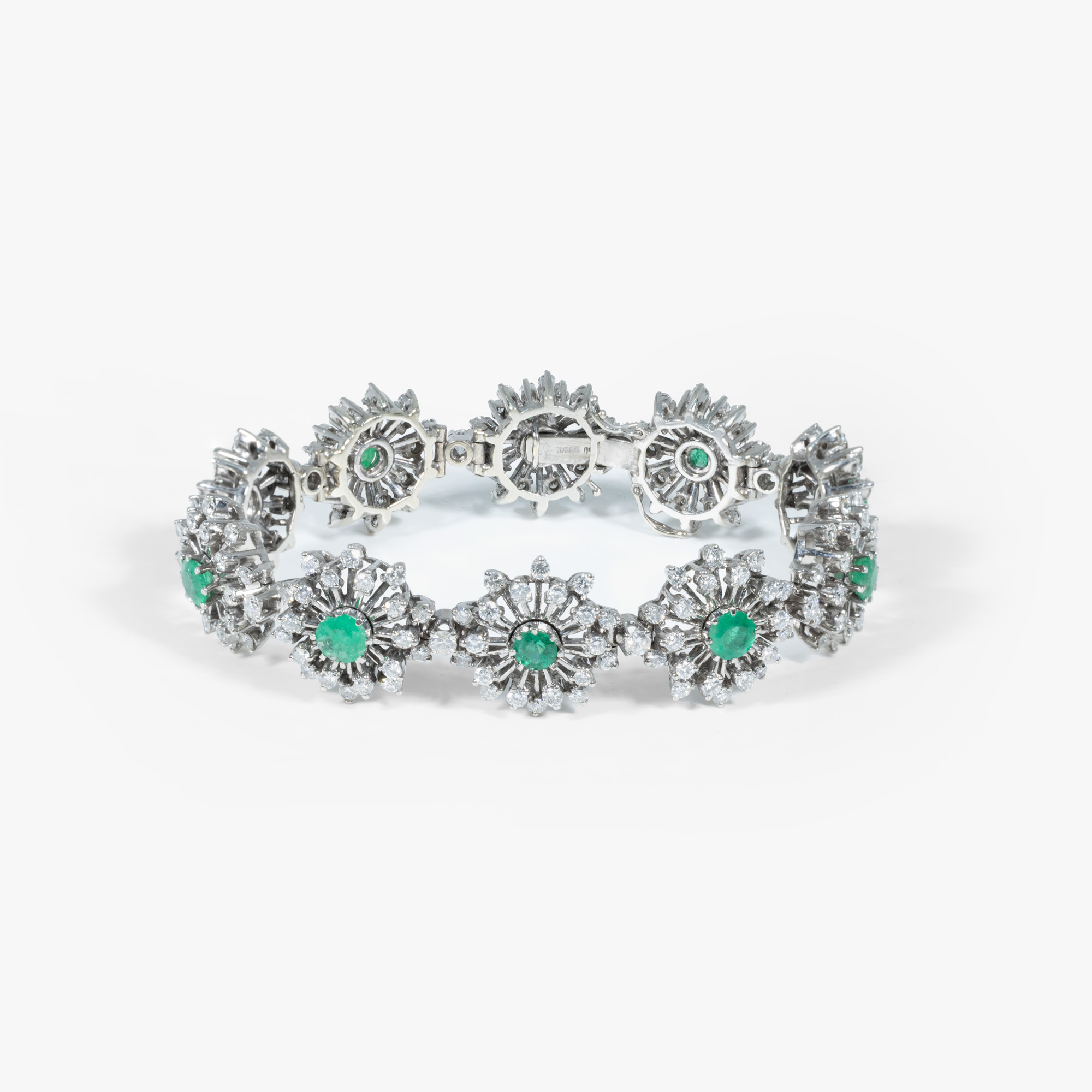 "Winter Flowers" - white gold bracelet, decorated with emeralds and diamonds, circa 1960, accompanied by an additional gemological certificate
