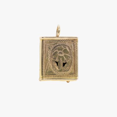 Gold pendant, shaped like a book, decorated with floral elements