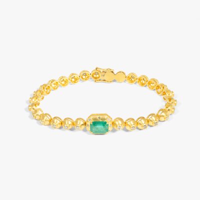 Gold bracelet, decorated with emerald and diamonds