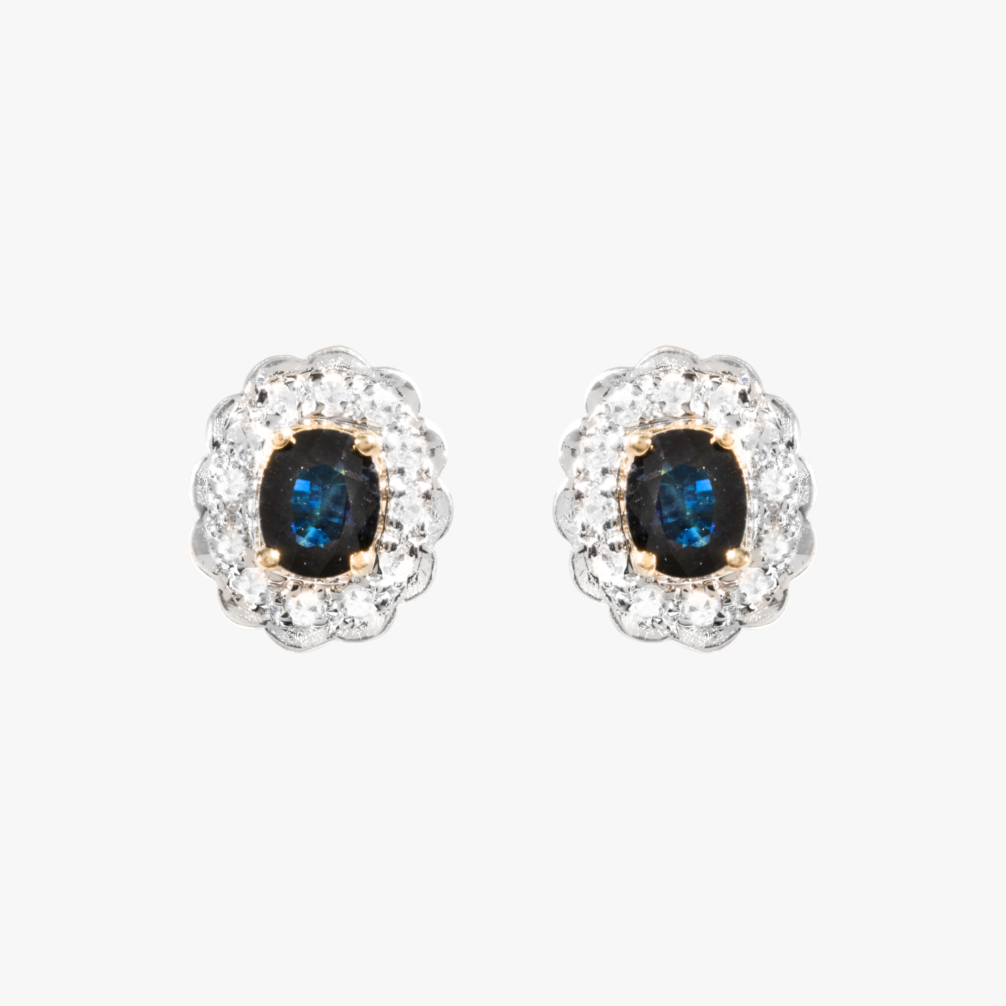 Pair of bicolor gold earrings, decorated with sapphires and diamonds
