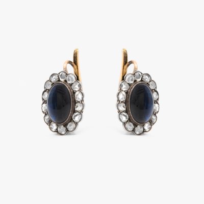 Pair of gold and silver earrings, decorated with cabochon sapphires and diamonds, cca. 1920