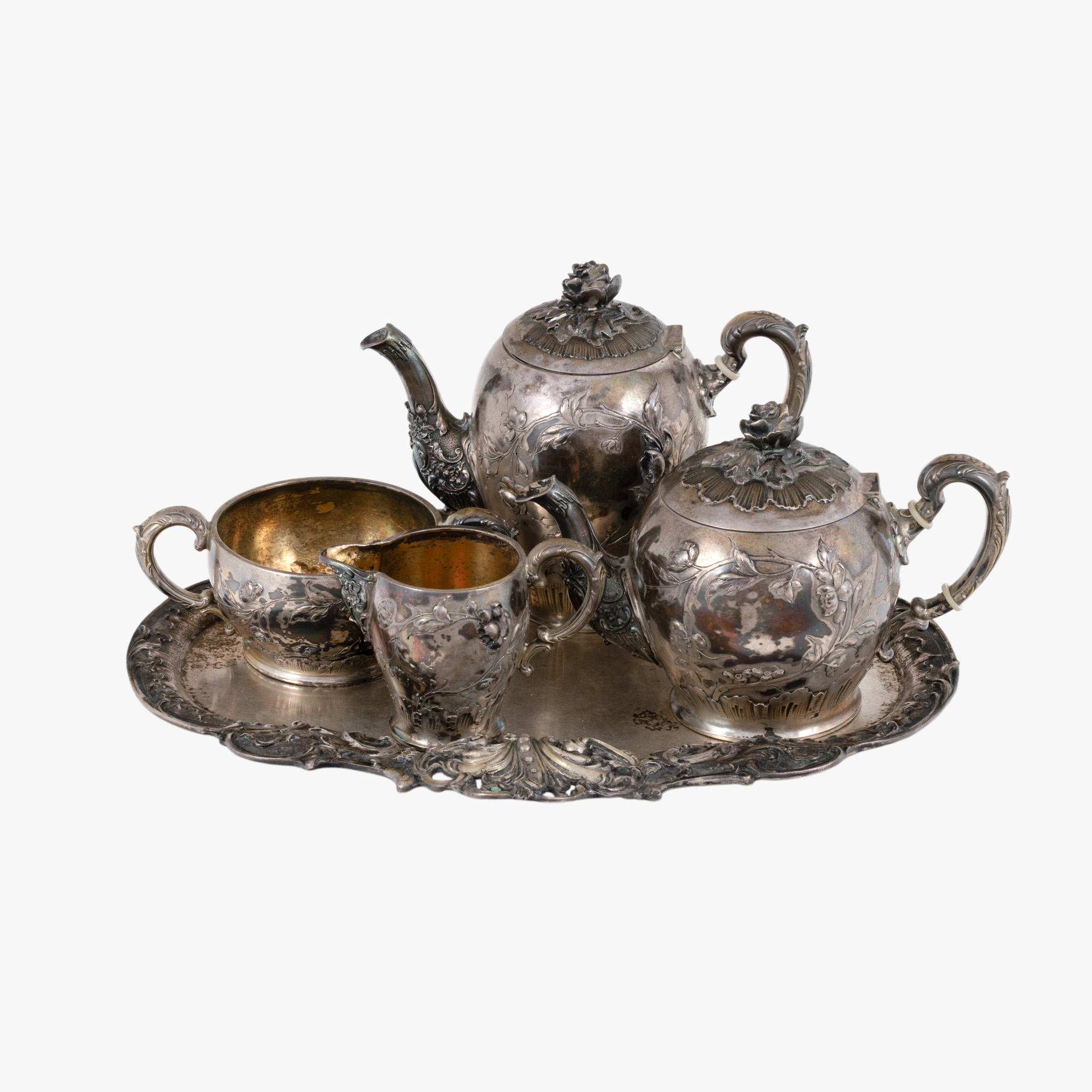 Serviciu din argint parțial aurit, format din cafetieră, ceainic, zaharniță, letieră și tavă, decorat cu motive florale, atelier Wollenweber, cca. 1890