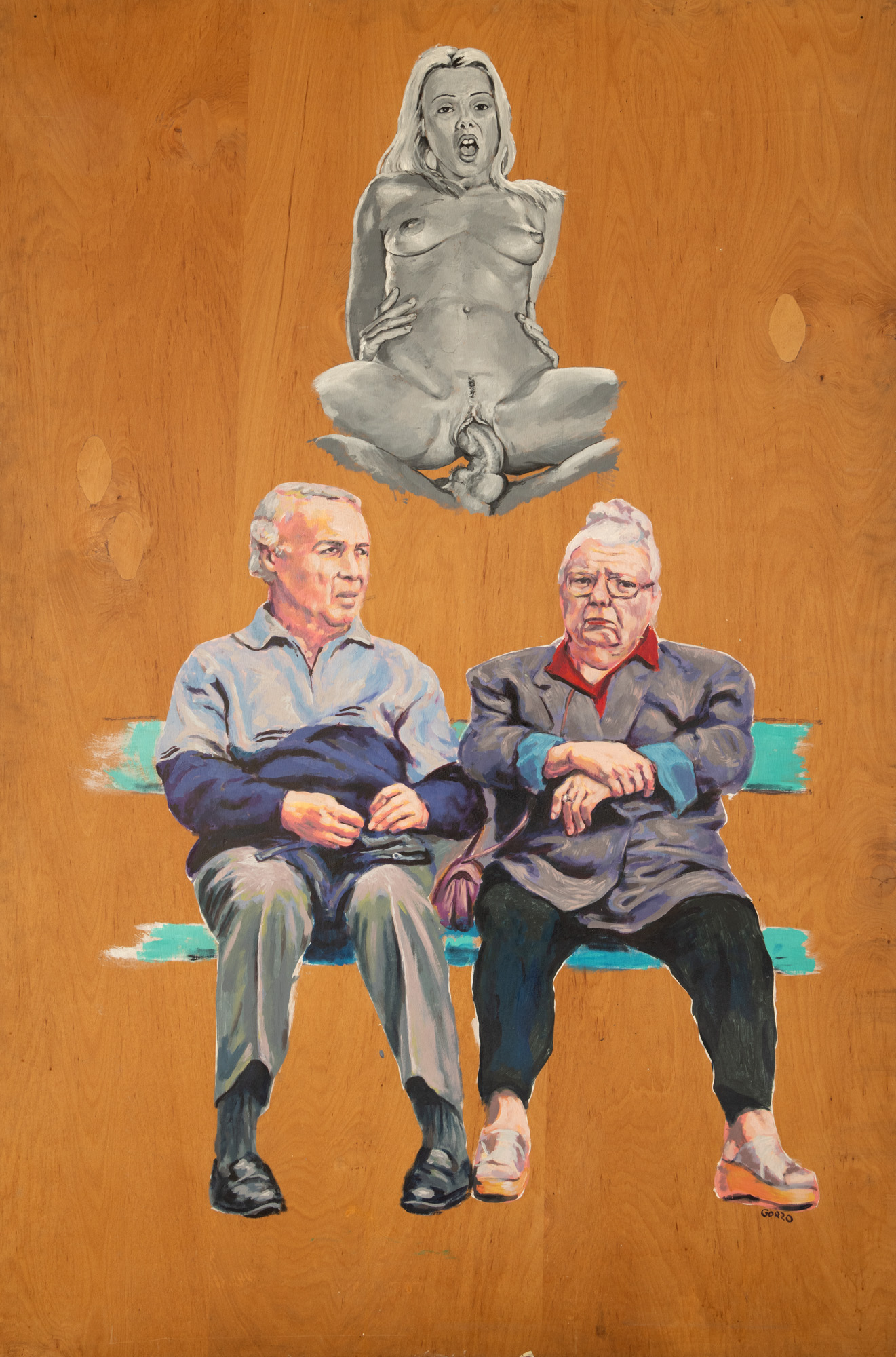 Grandparents sit in the park