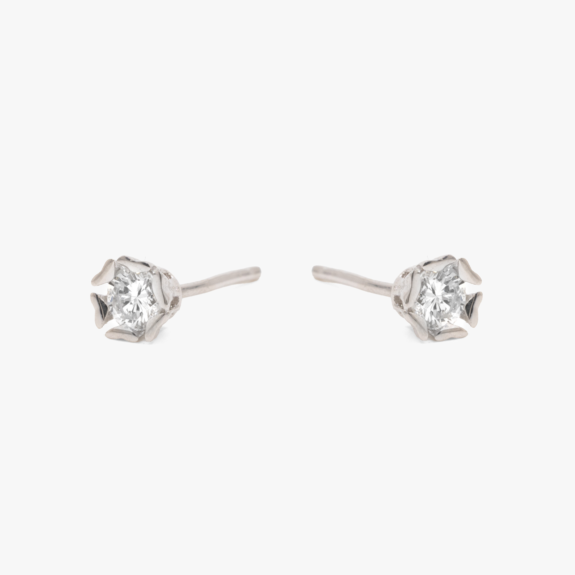 Pair of white gold earrings, decorated with two diamonds