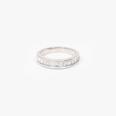 White gold ring, decorated with a row of diamonds