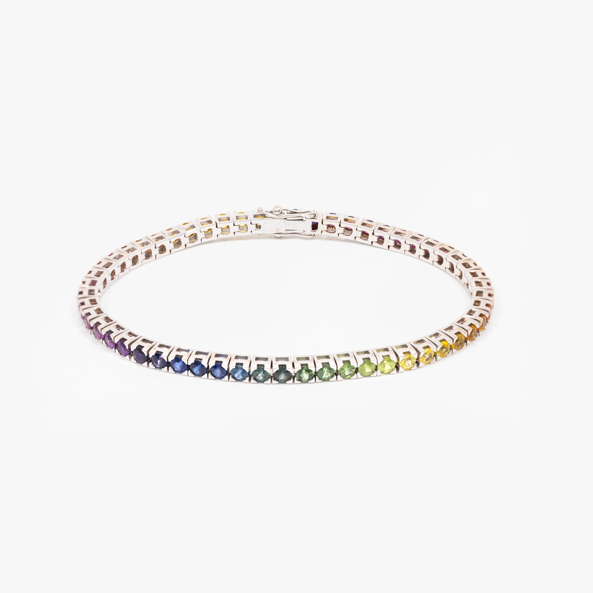 "Rainbow" - Tennis bracelet, made of white gold, paved with multicolored sapphires, accompanied by additional gemological certificate