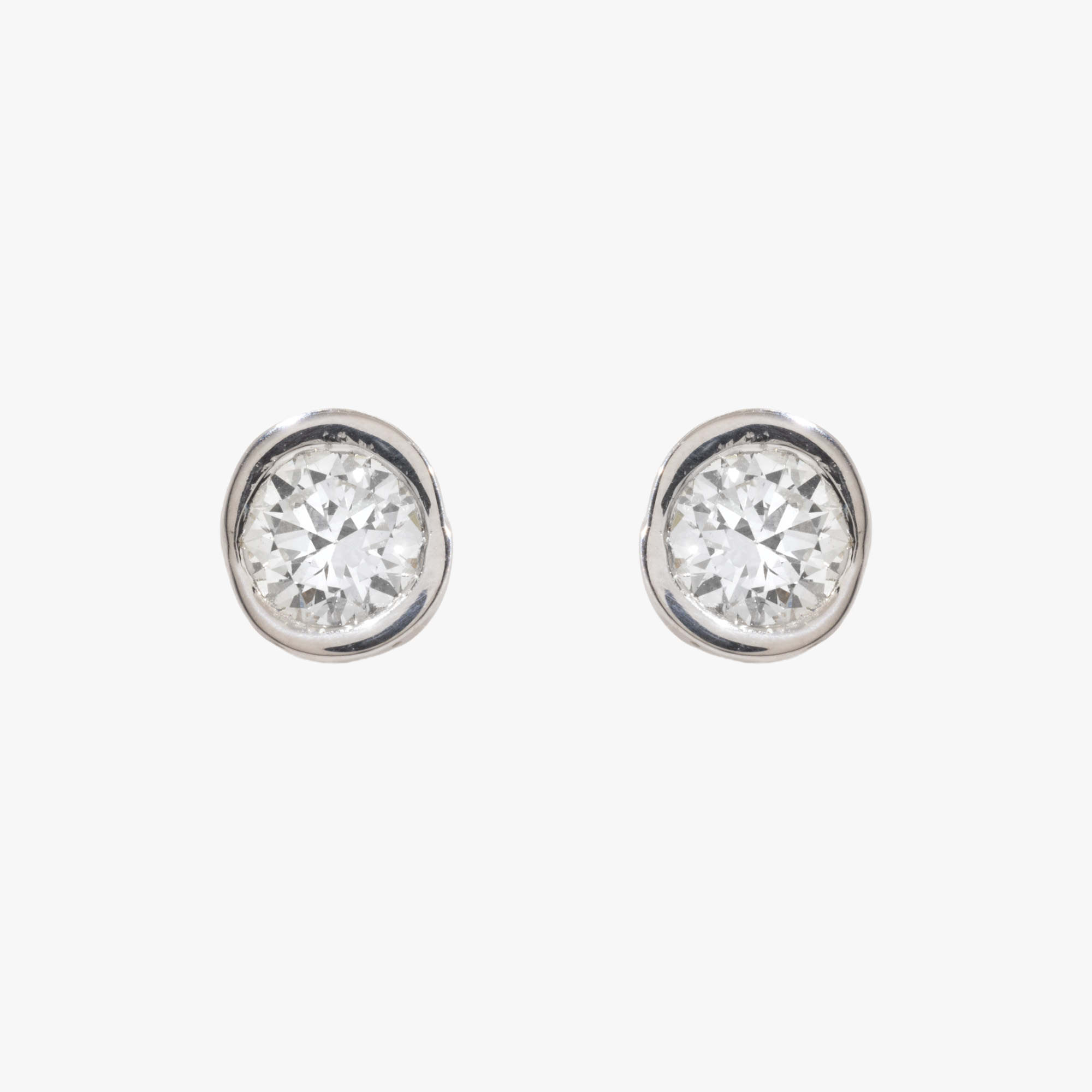Pair of white gold earrings, adorned with diamonds