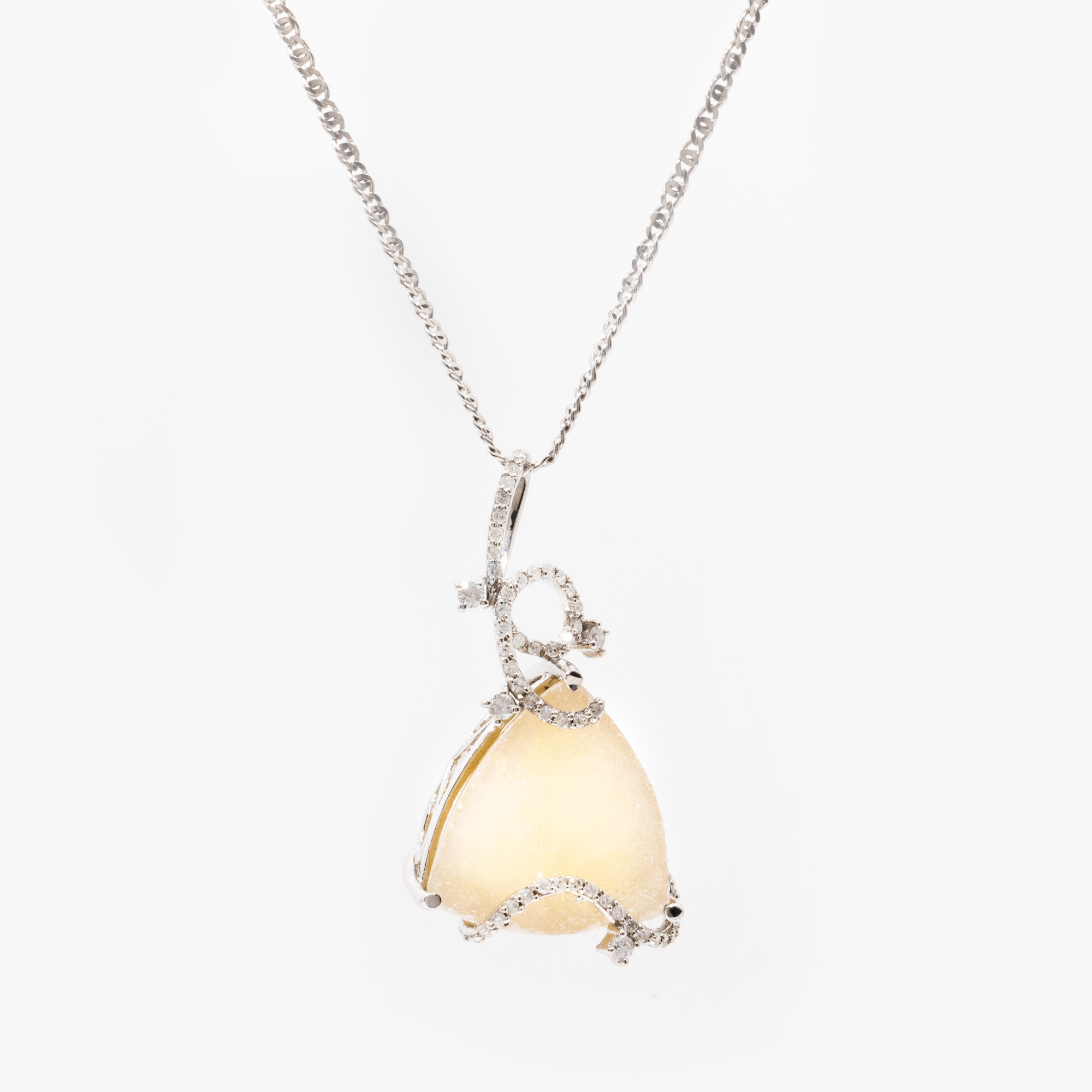 White gold chain with pendant, decorated with chalcedony and diamonds