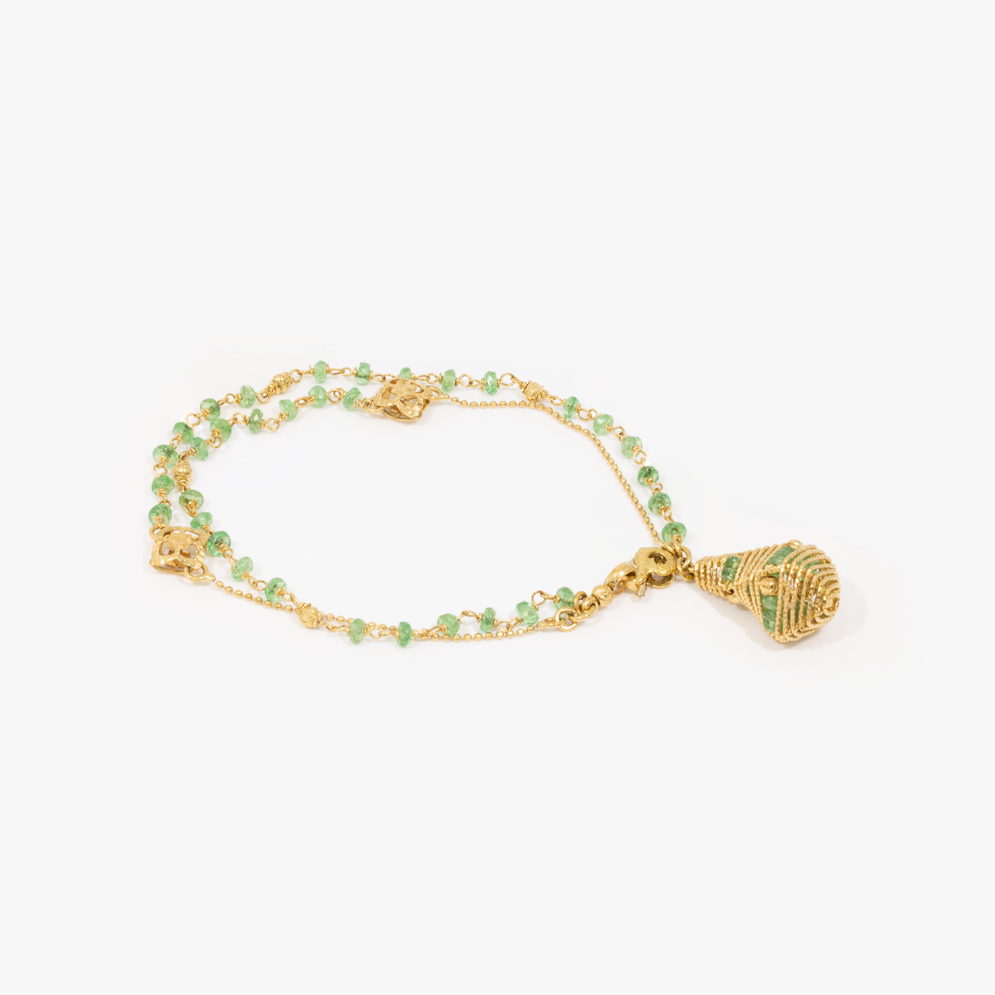 Gold bracelet, decorated with tsavorites