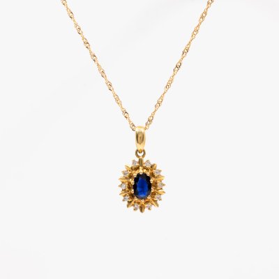 Gold chain with sapphire and diamond pendant