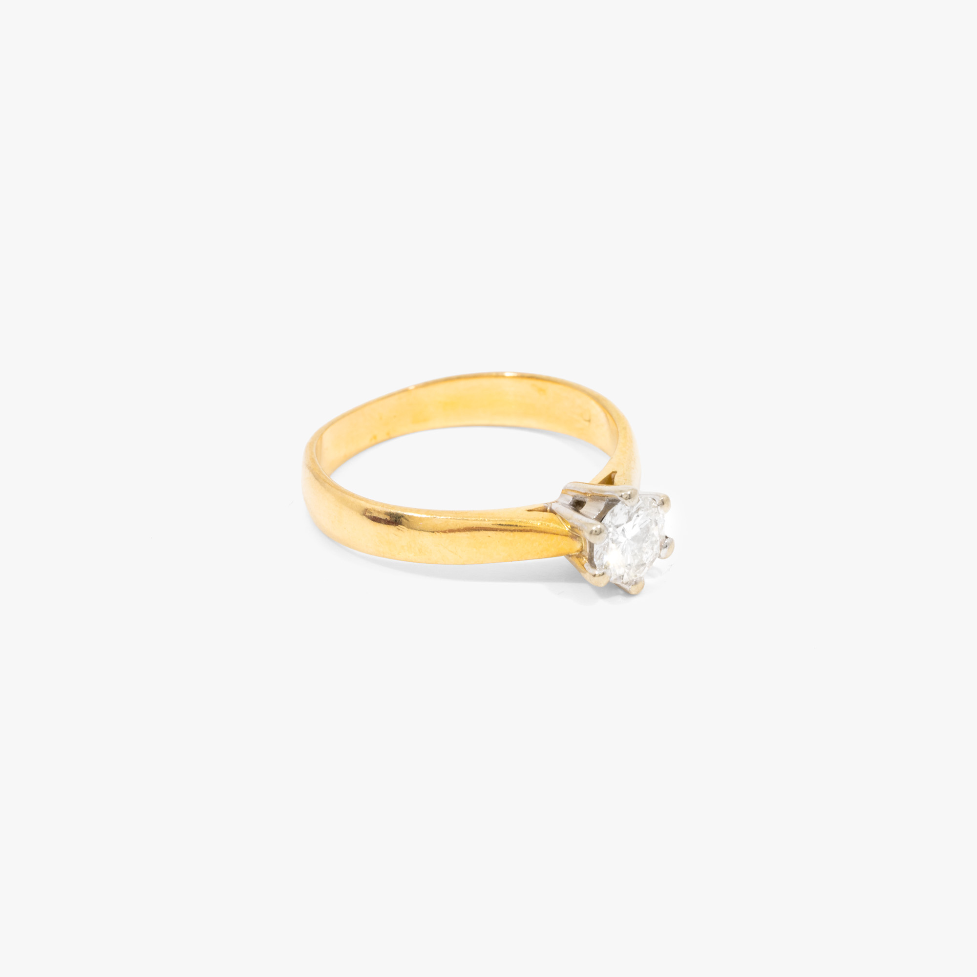 Bicolor gold ring, decorated with solitaire diamond, accompanied by IGI certificate